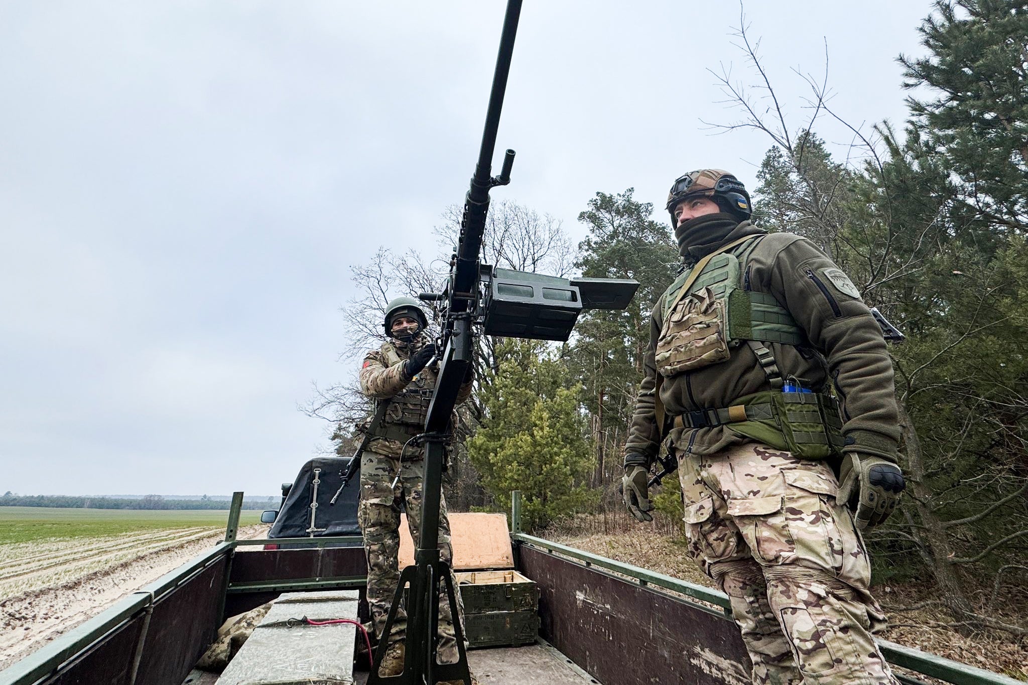 Tucked into a wood on the southern outskirts of Kyiv, a small group of middle-aged men, who joined up when Russia launched its full-scale invasion three years ago, prepare for another night