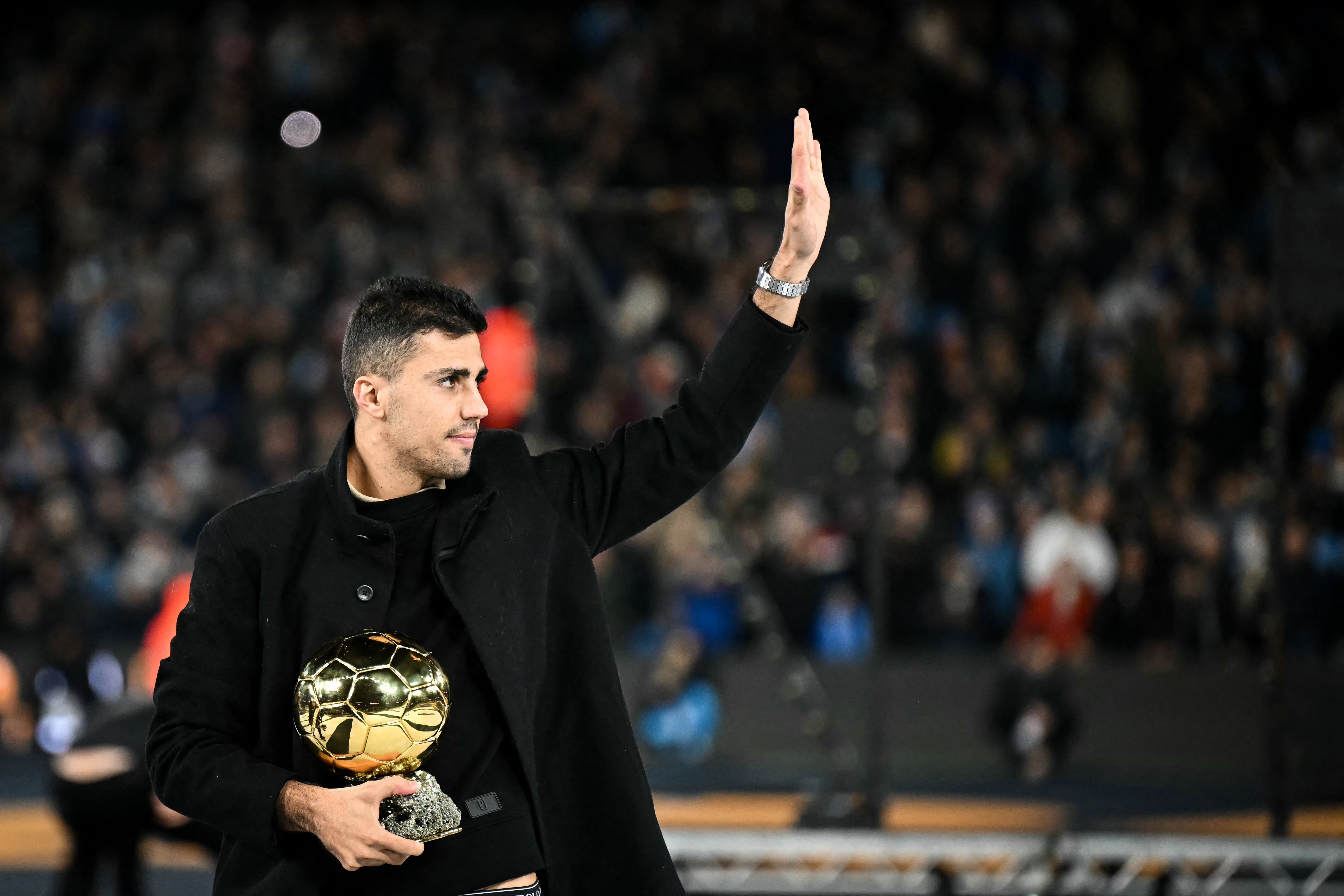 Manchester City midfielder Rodri acknowledges the fans at the Etihad Stadium