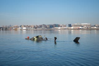 The wreckage of the Black Hawk helicopter in the Potomac