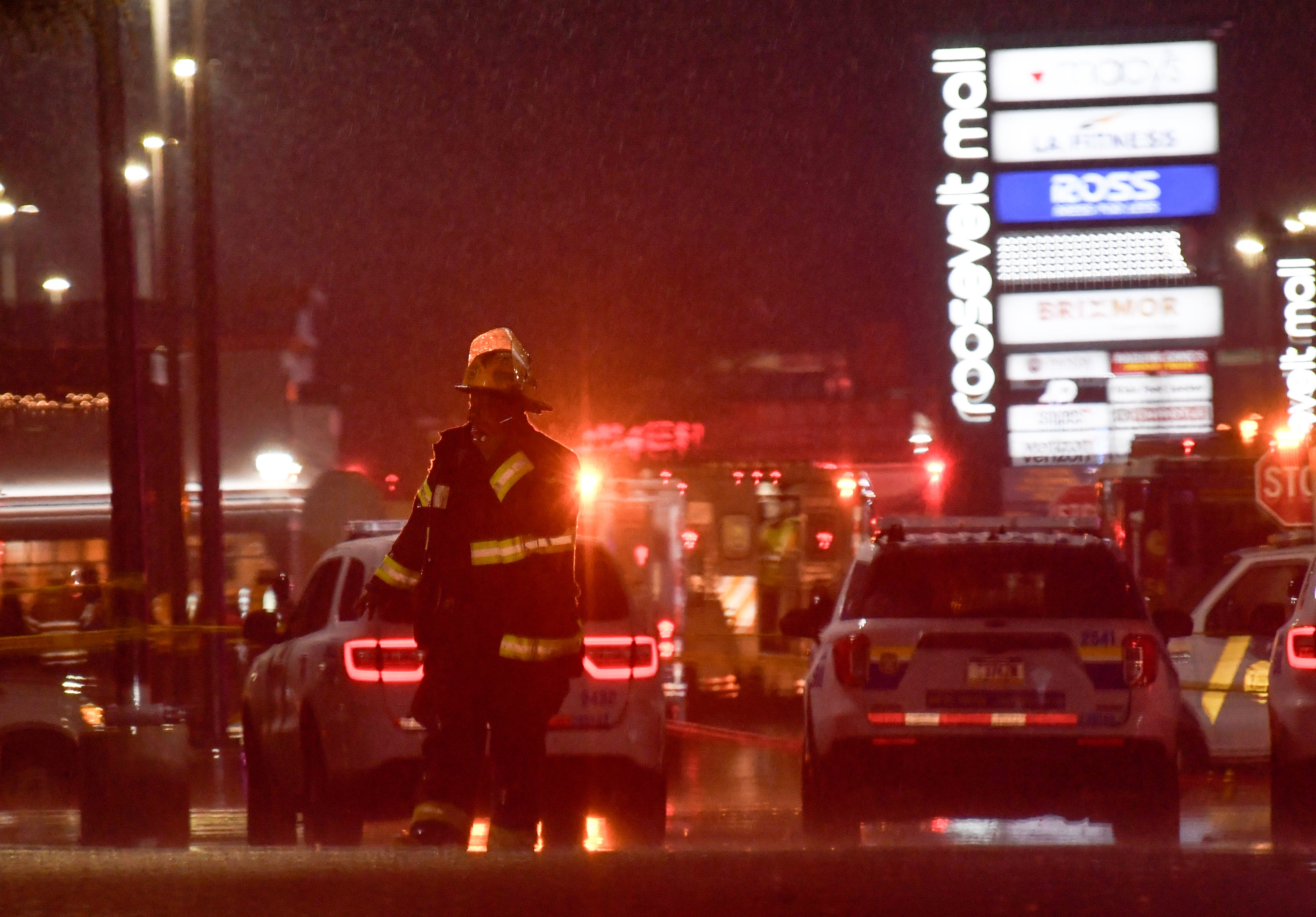 Emergency service members respond to a plane crash in a neighborhood near Cottman Avenue on 31 January 2025 in Philadelphia, Pennsylvania