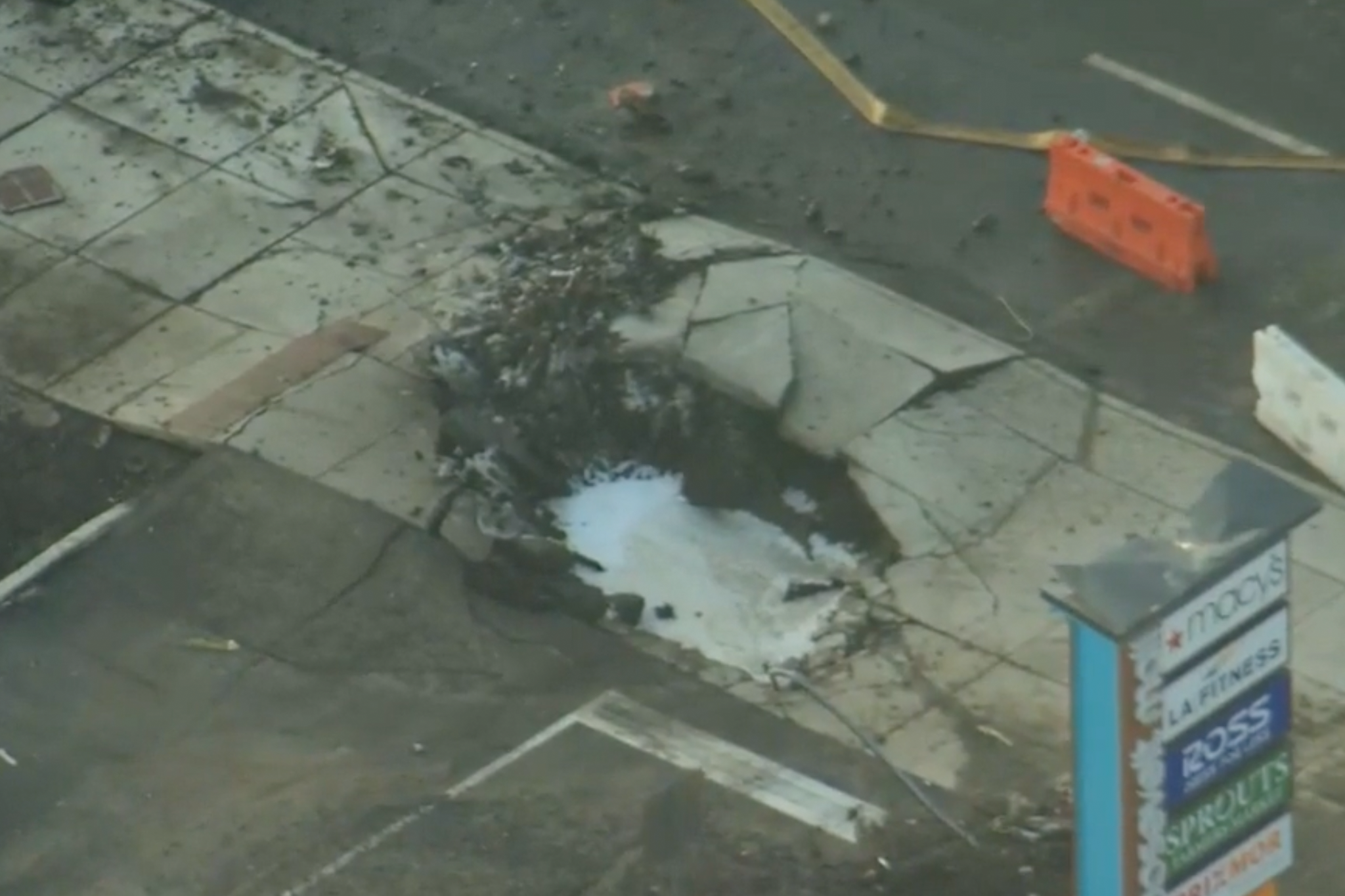 Philadelphia plane crash: Daylight aerials show crater, debris field from jet crash