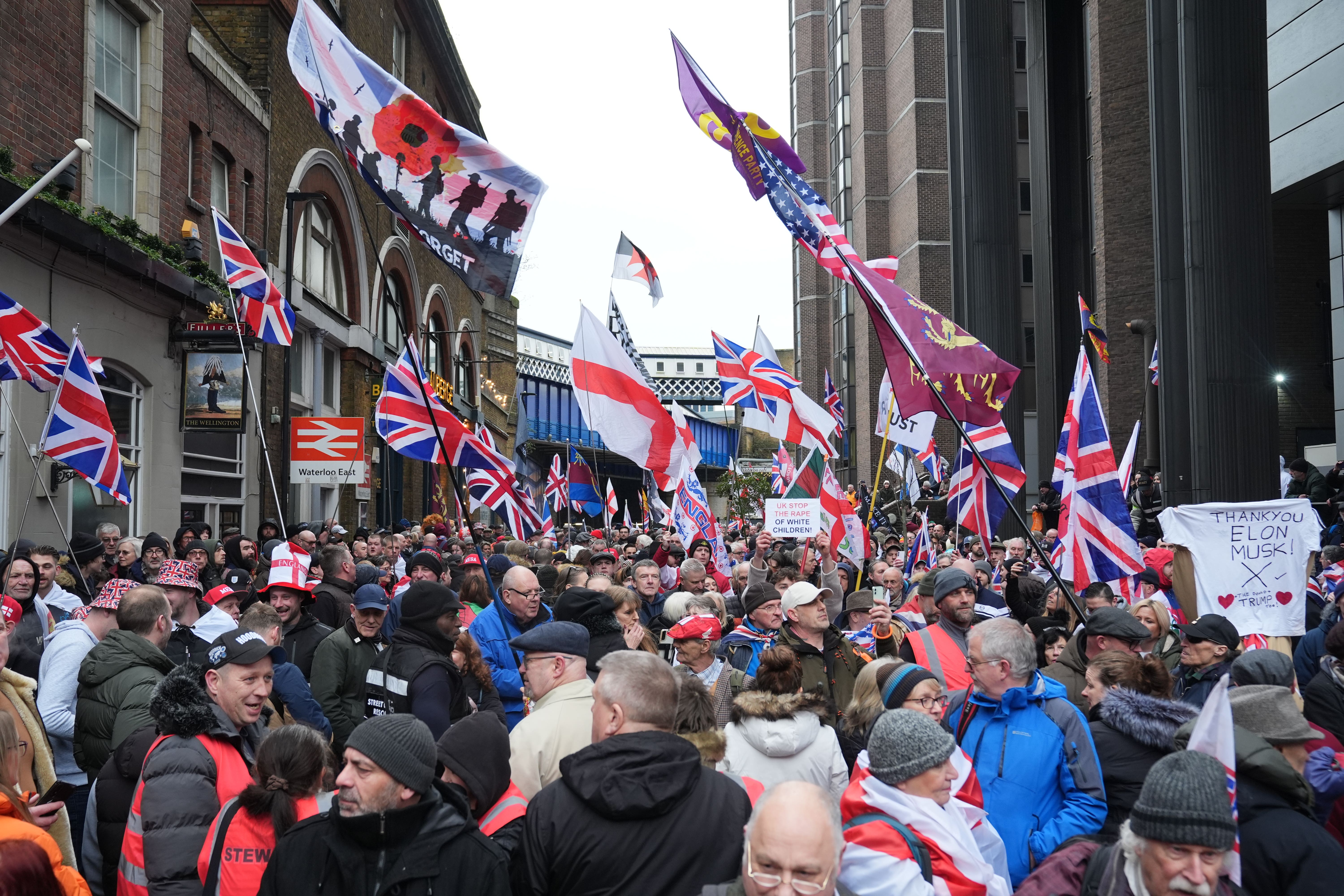 Thousands of Tommy Robinson supporters have marched through central London demanding his release from prison (Lucy North/PA)