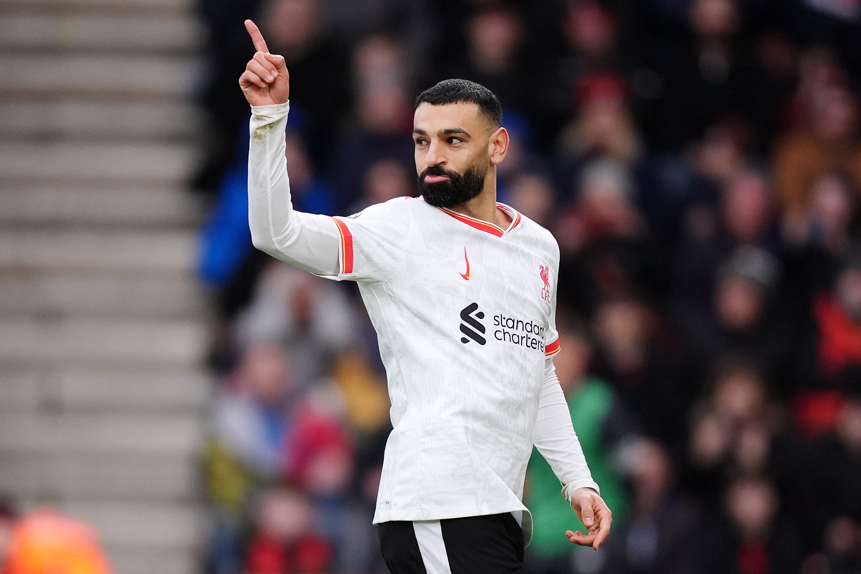 <p>Mo Salah celebrates after scoring Liverpool's opener</p>