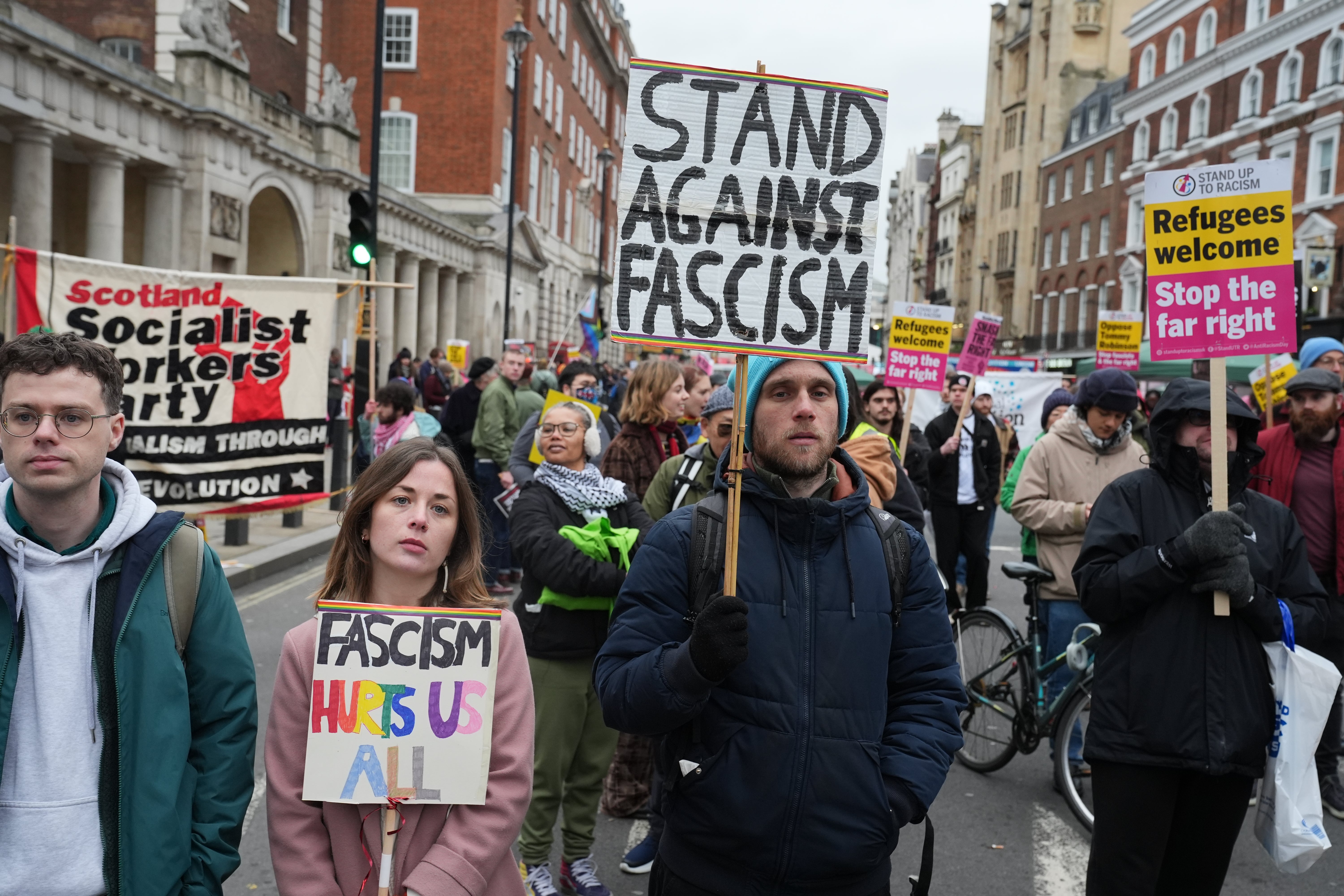 People during a Stand Up To Racism counter-protest against a Tommy Robinson supporters protest