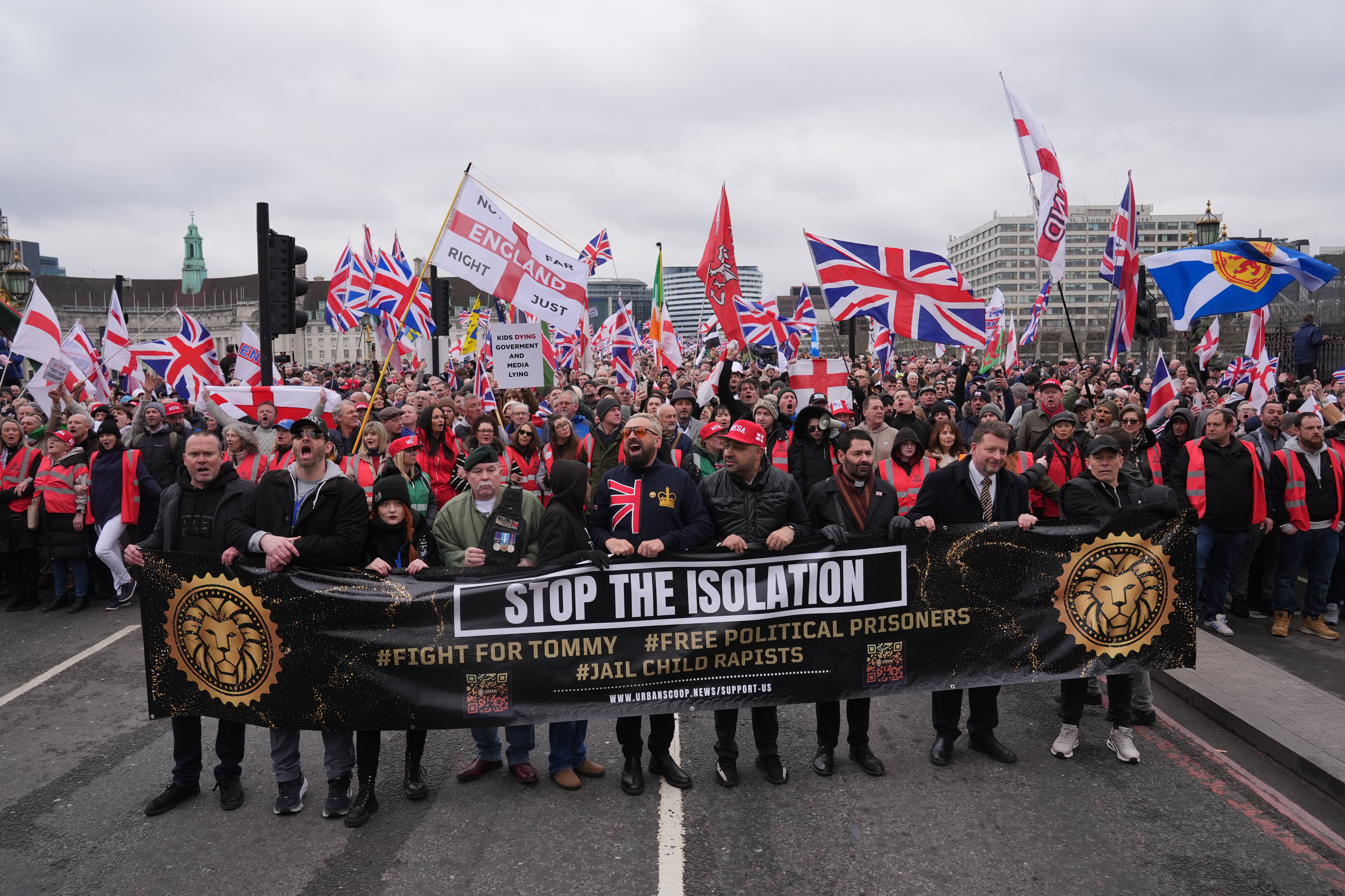 Some demonstrators were wearing “MEGA – Make England Great Again” hats and “I am Tommy” stickers with many attendees livestreaming the event on their phones.