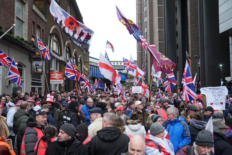 Police arrest six people as Tommy Robinson supporters enter counter-demo area at London protest