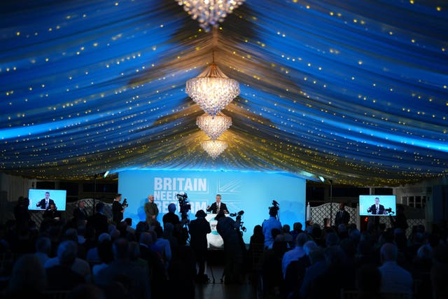 Reform UK leader Nigel Farage speaking at a rally in Essex on Friday. The party has since held another event in the north east of England (Jordan Pettitt/PA)