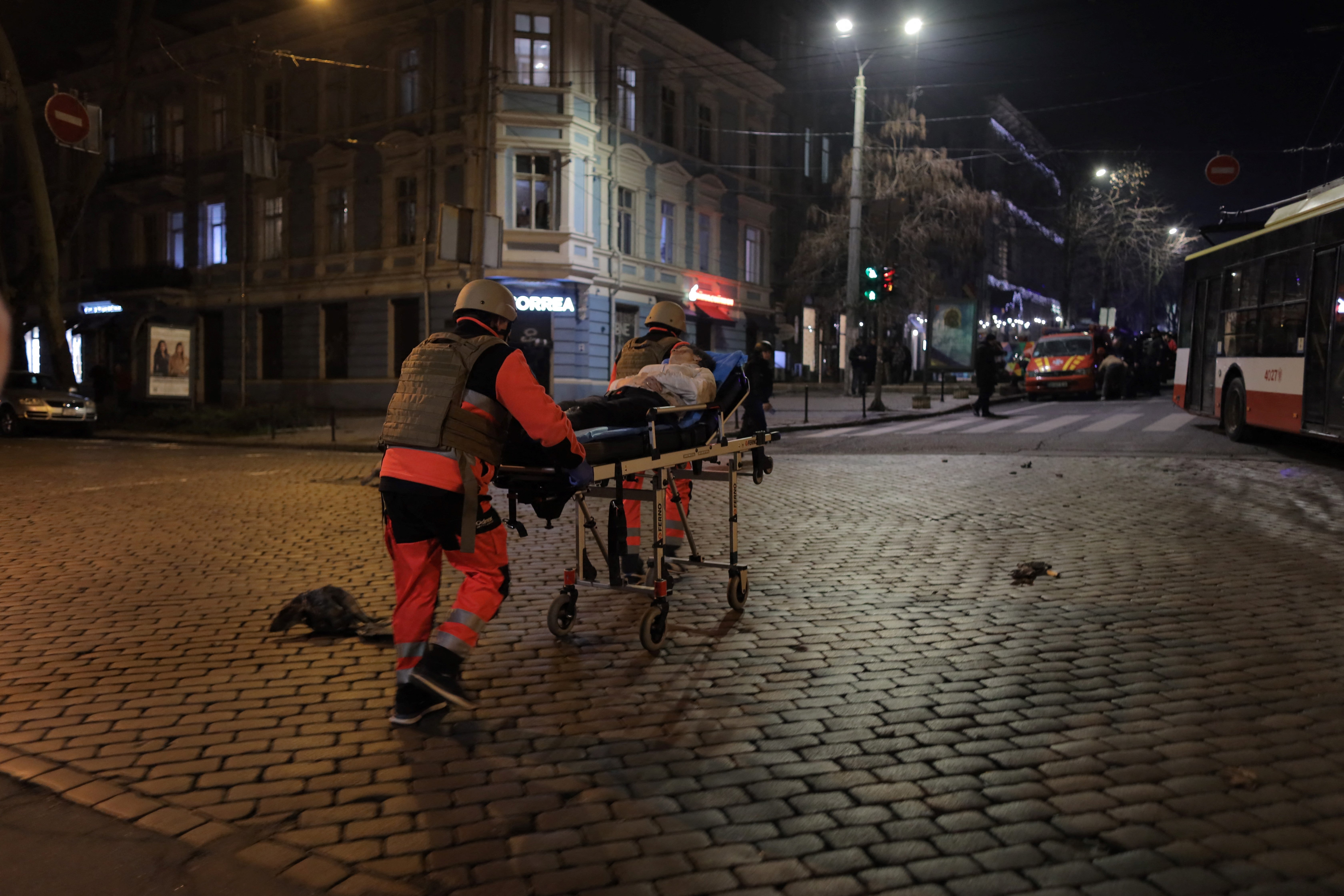 Rescuers evacuate a wounded person following a Russian missile attack in Odesa on 31 January 2025