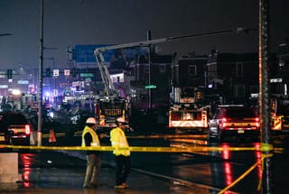 Emergency service members respond to a plane crash in a neighborhood near Cottman Avenue on 31 January 2025 in Philadelphia