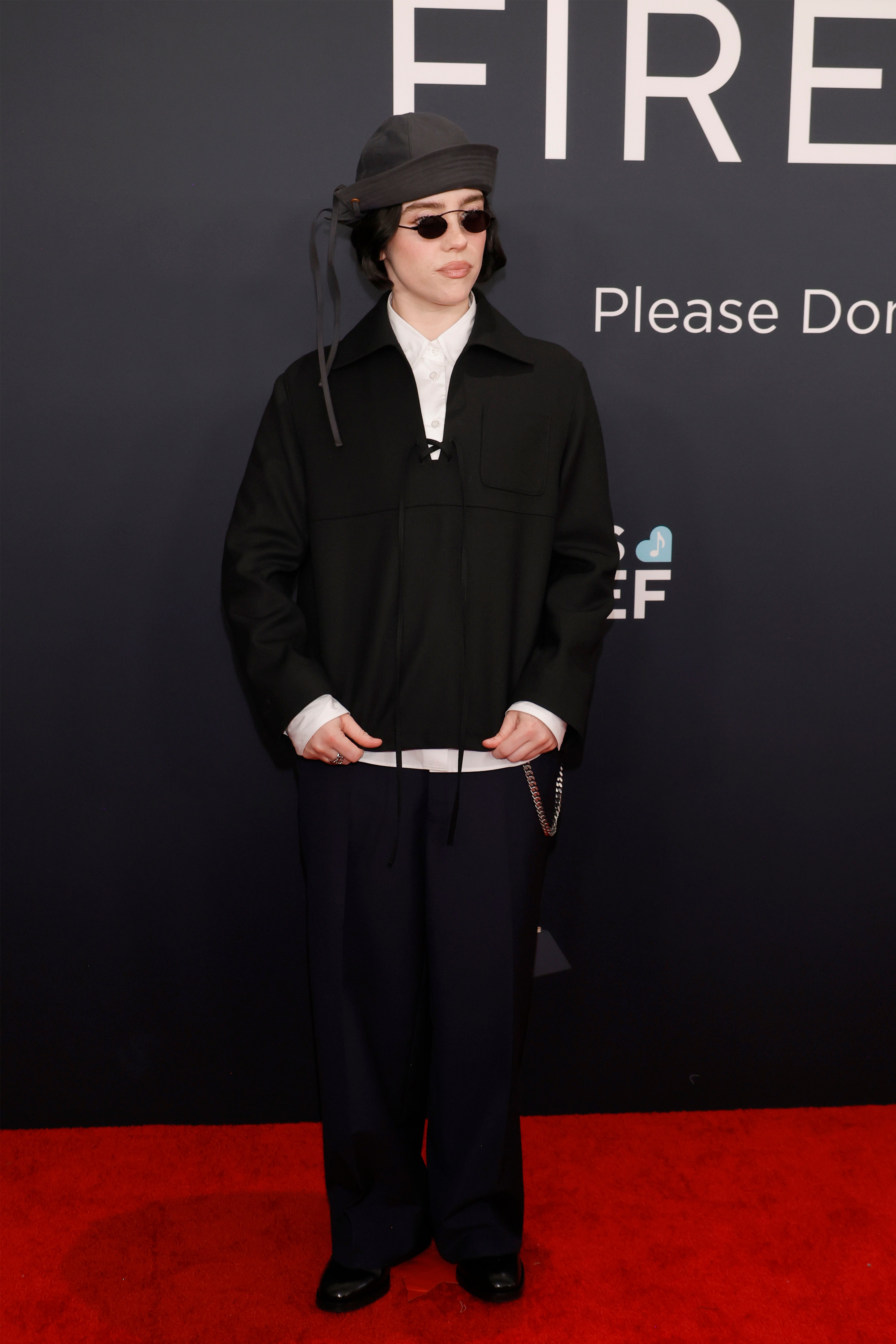 Billie Eilish wears casual black jacket and pants at the Grammys