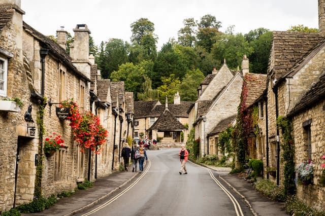 <p>Cottages and houses on The St in the village of Castle Combe, Wiltshire</p>