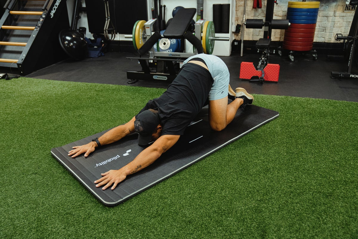 Flexibility expert recommends four stretches for easing back pain and tight hips after too much sitting