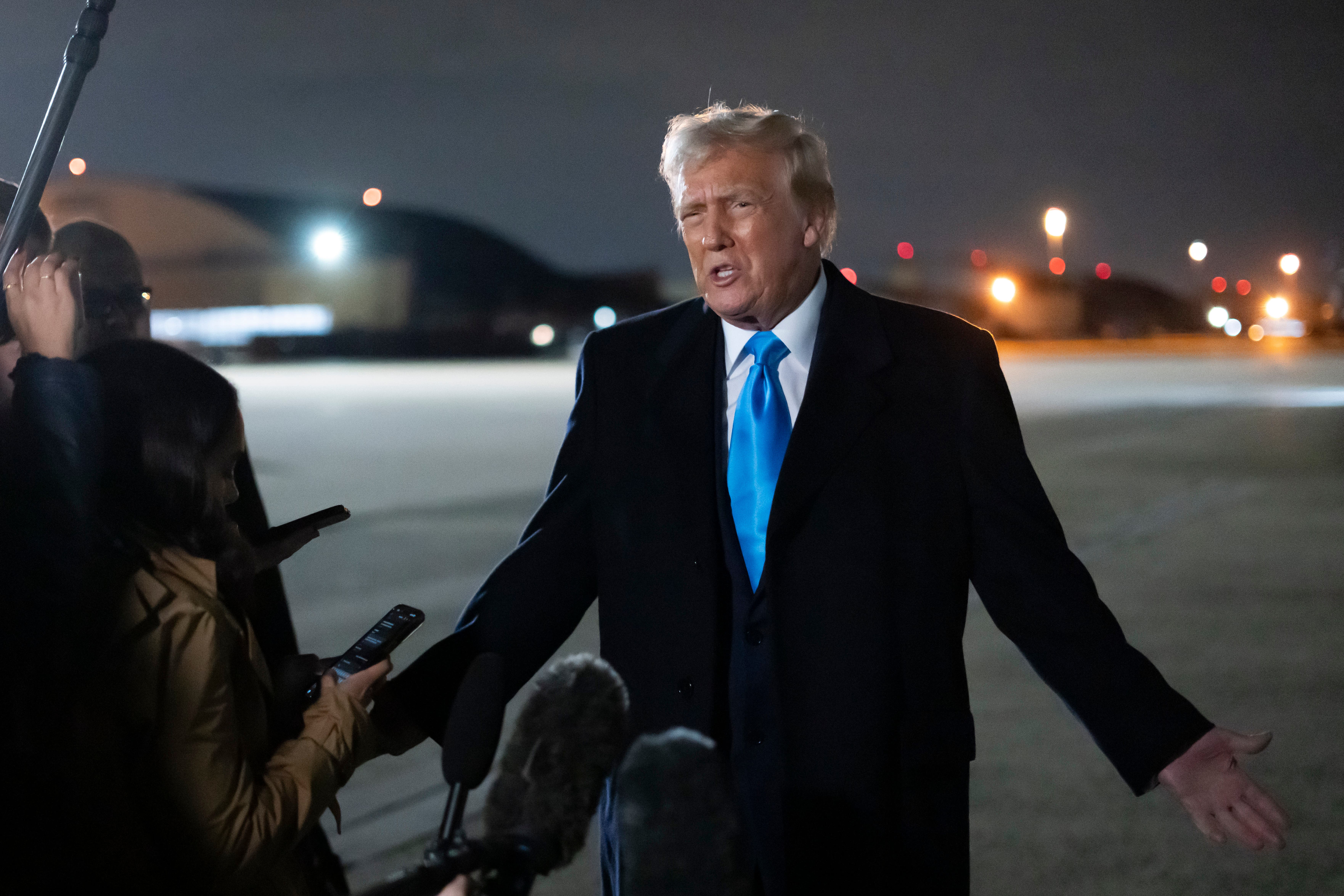 President Donald Trump speaks to reporters about the tariffs at Joint Base Andrews