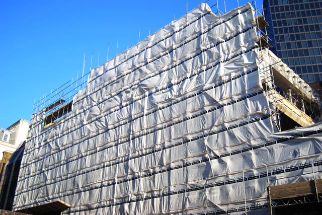A cladding safety campaigner has branded a target date of 2029 for when buildings in England will have dangerous cladding removed ‘meaningless’ (Alamy/PA)