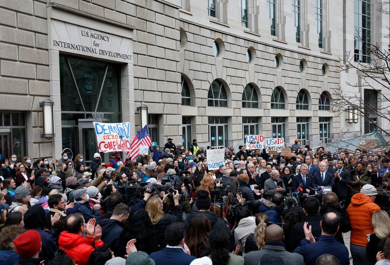 Democratic lawmakers blocked from USAID offices as they protest Elon Musk efforts to dismantle it