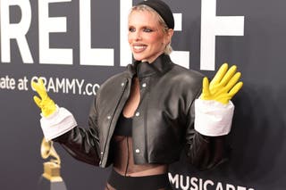 Julia Fox stuns Grammys red carpet with yellow kitchen gloves and sheer