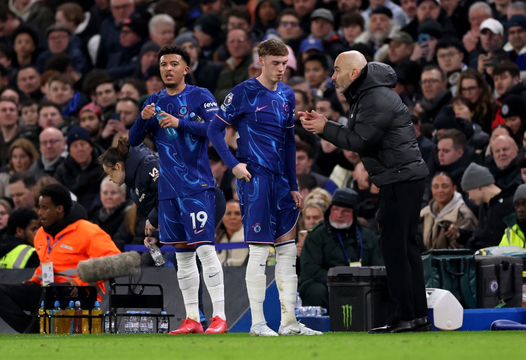 Chelsea manager Enzo Maresca passes on instructions to Cole Palmer on the touchkine