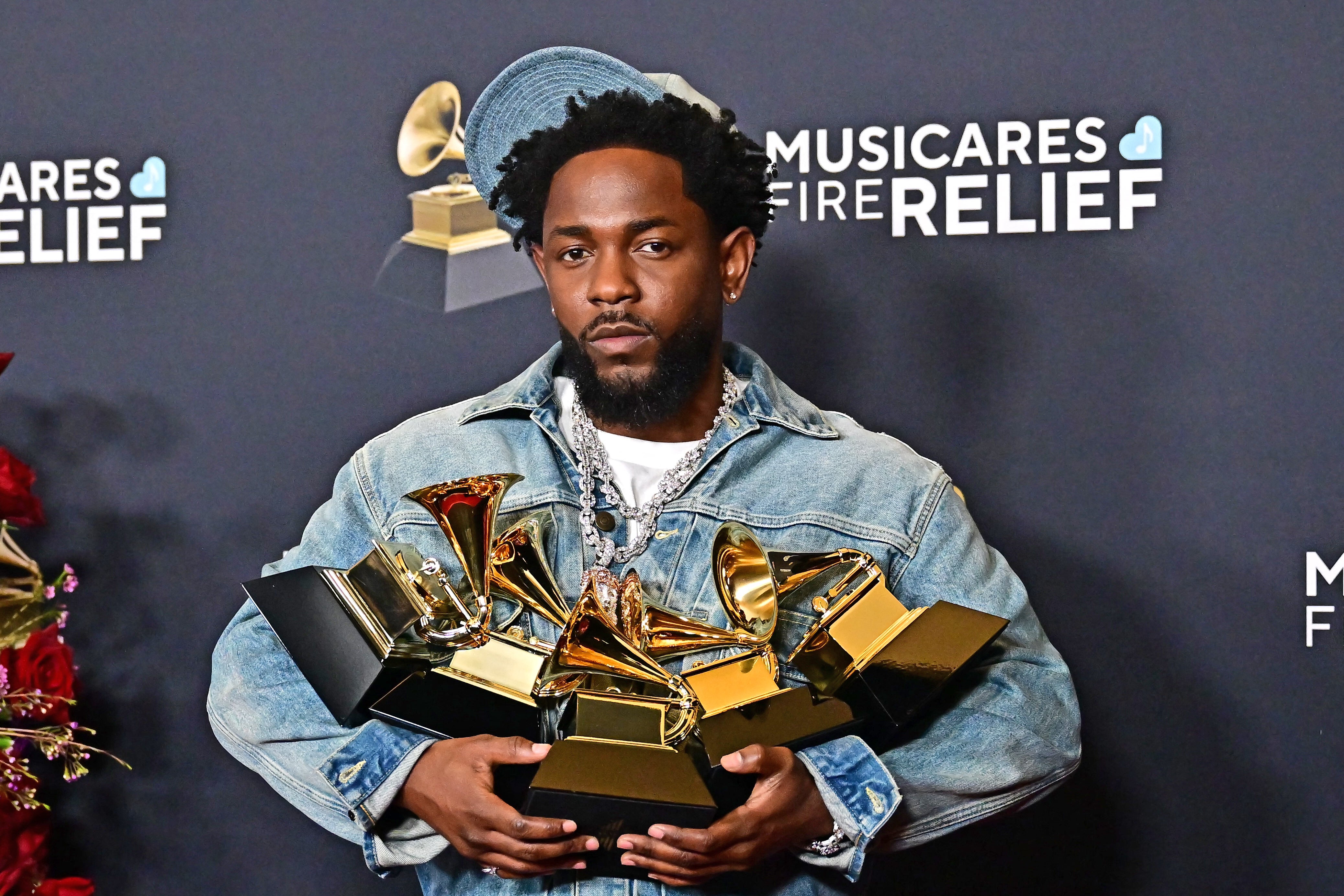 Kendrick Lamar with his Grammy Awards