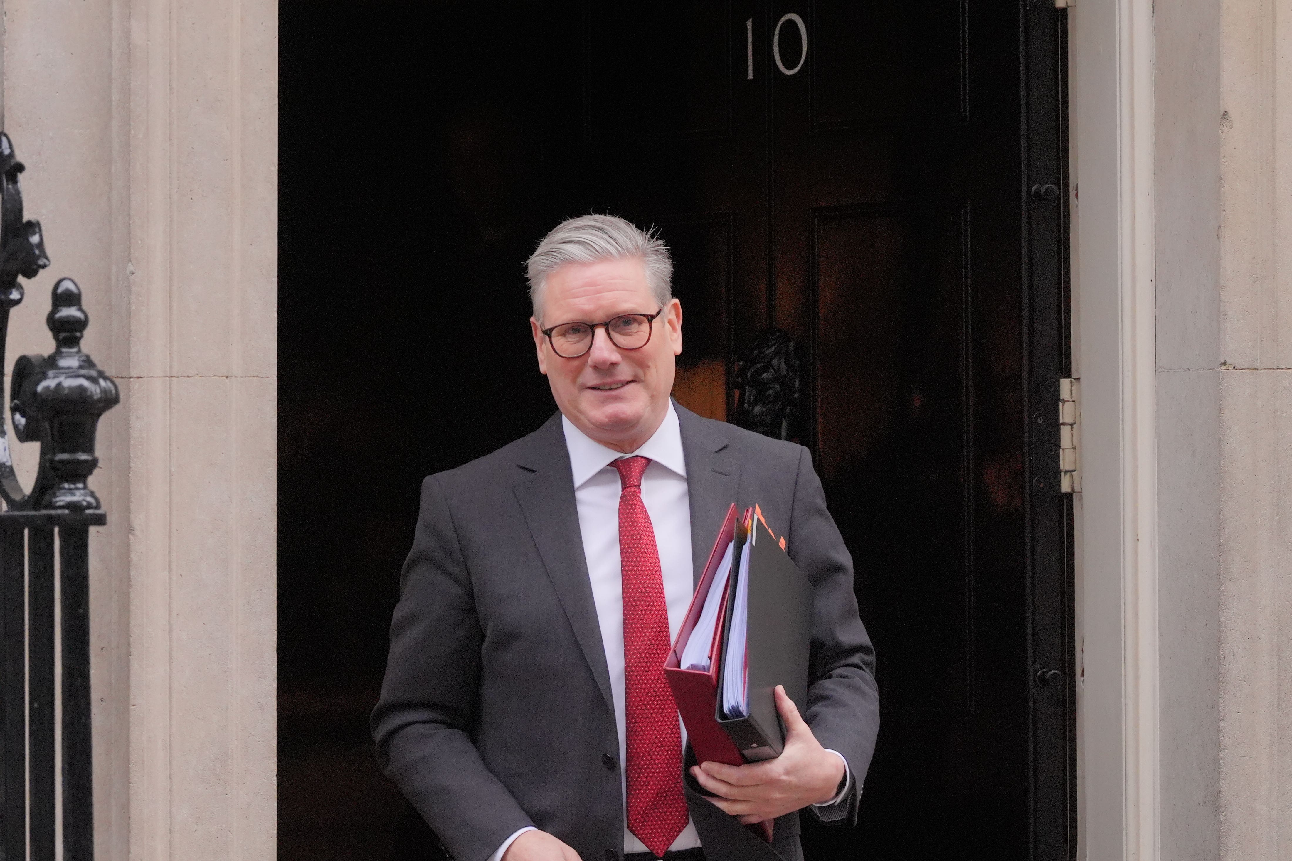 <p>Prime Minister Sir Keir Starmer departs 10 Downing Street (PA)</p>