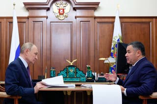 Russia's President Vladimir Putin attends a meeting with Tver Region Governor Igor Rudenya in Moscow