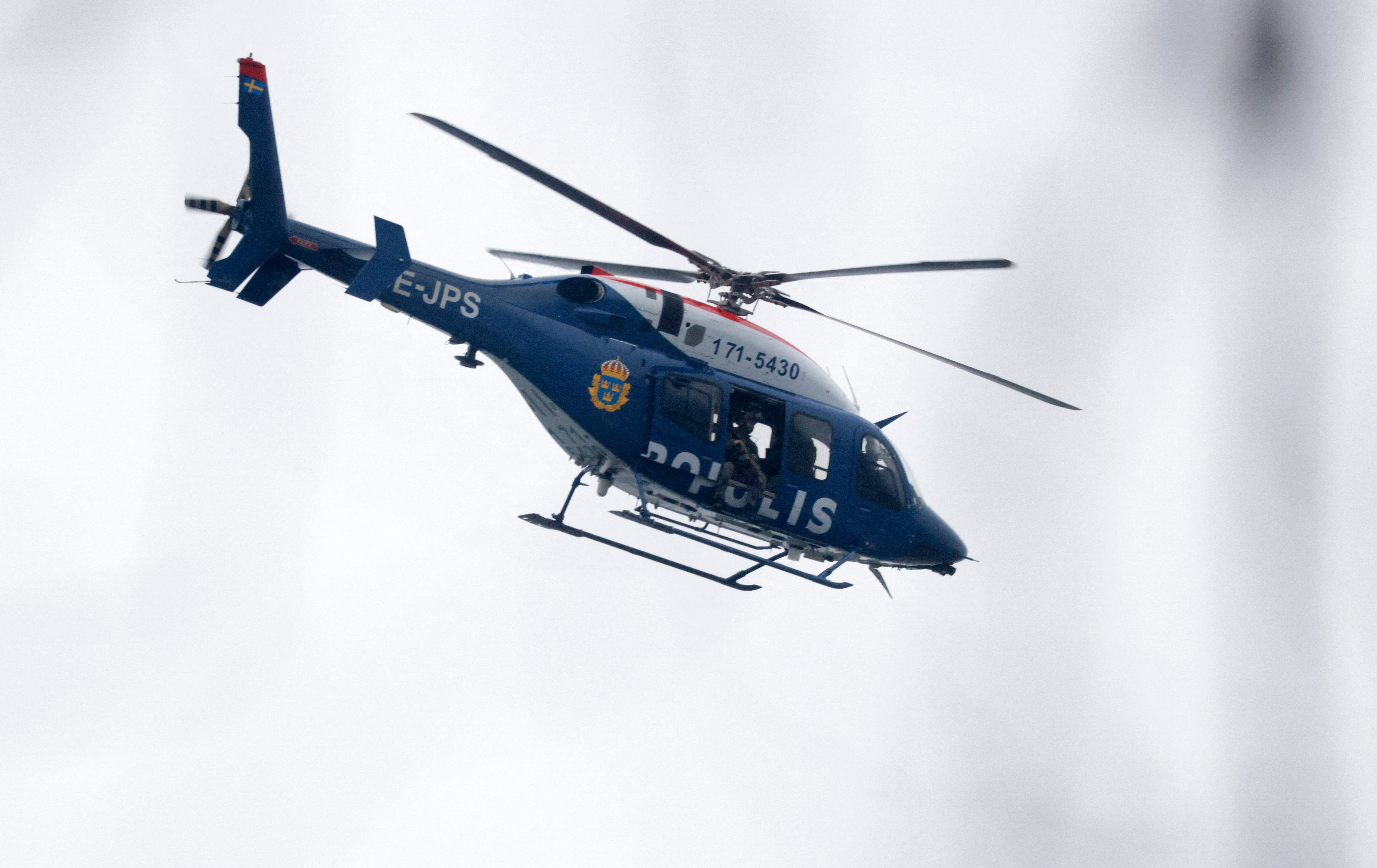 A police helicopter was pictured flying near the scene