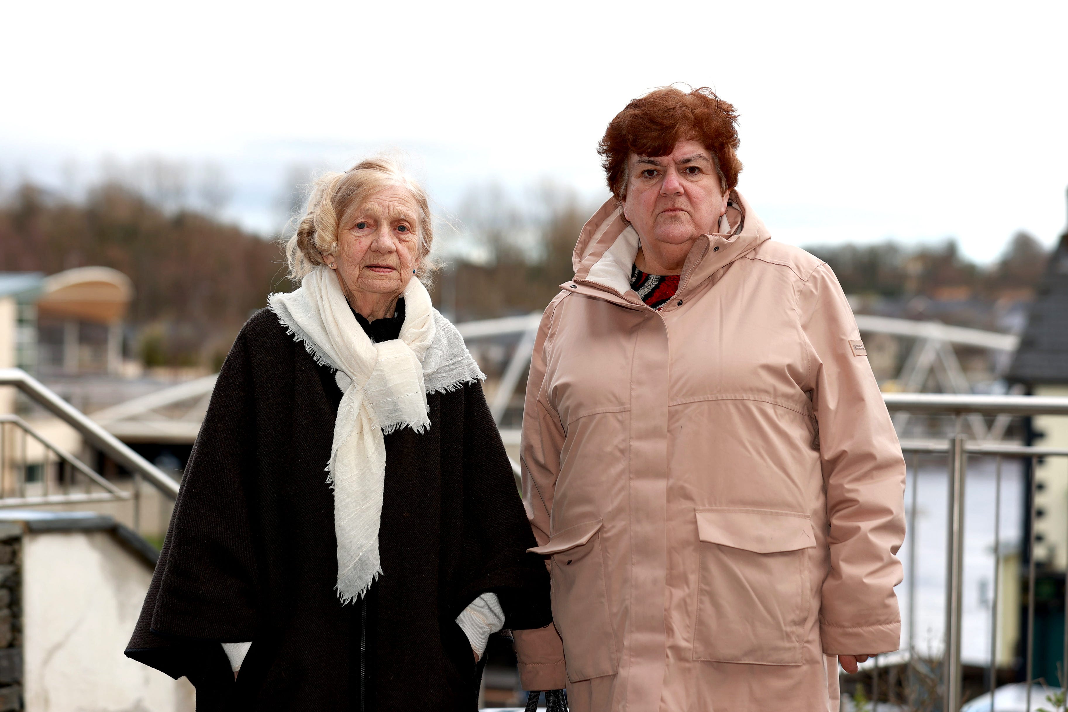 Gertrude Barrett (left), mother of Michael Barrett, who died in the Stardust fire, and Lorraine Sorohan (right), sister of Teresa McDonnell who also died in the tragedy (Liam McBurney/PA)