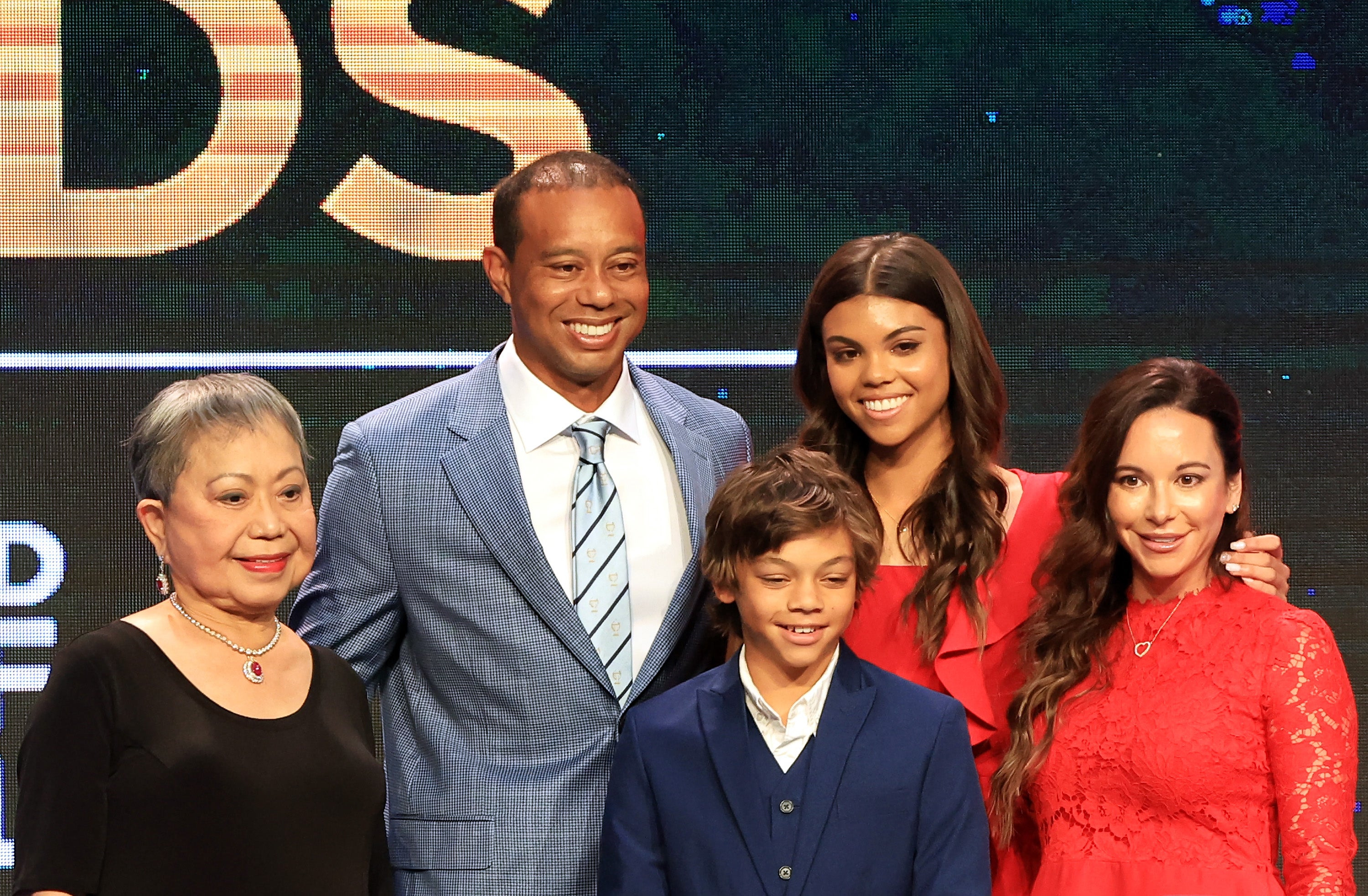 Kultida Woods, left, pictured with Tiger, his children Sam and Charlie, and his ex-partner Erica Herman, at his induction to the World Golf Hall of Fame in March 2022