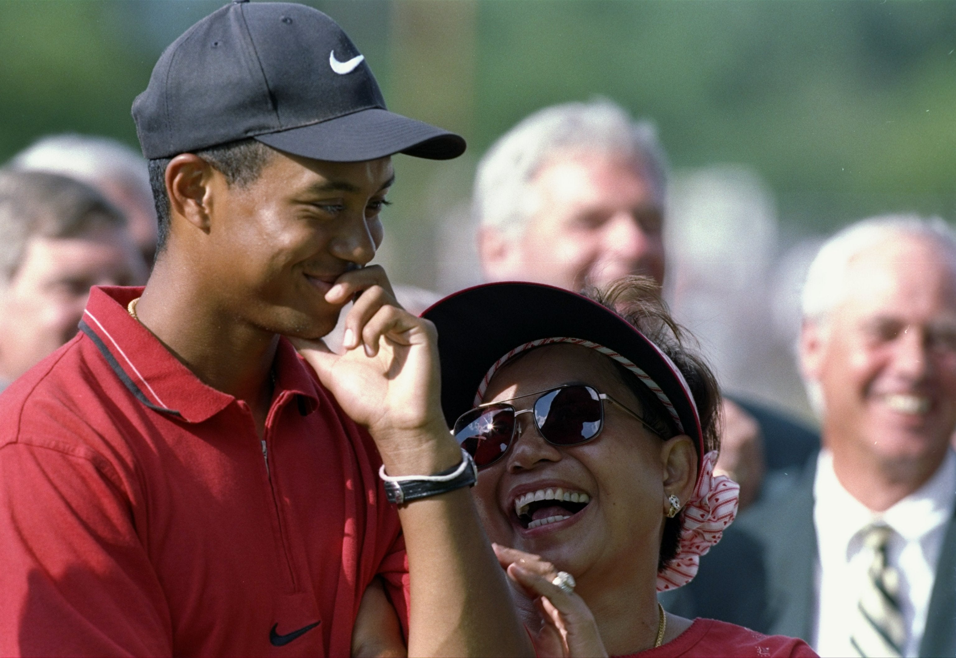 Tiger Woods smiles with his mother Kultida at the Cog Hill Country Club in Lemont, Illinois, in July 1997