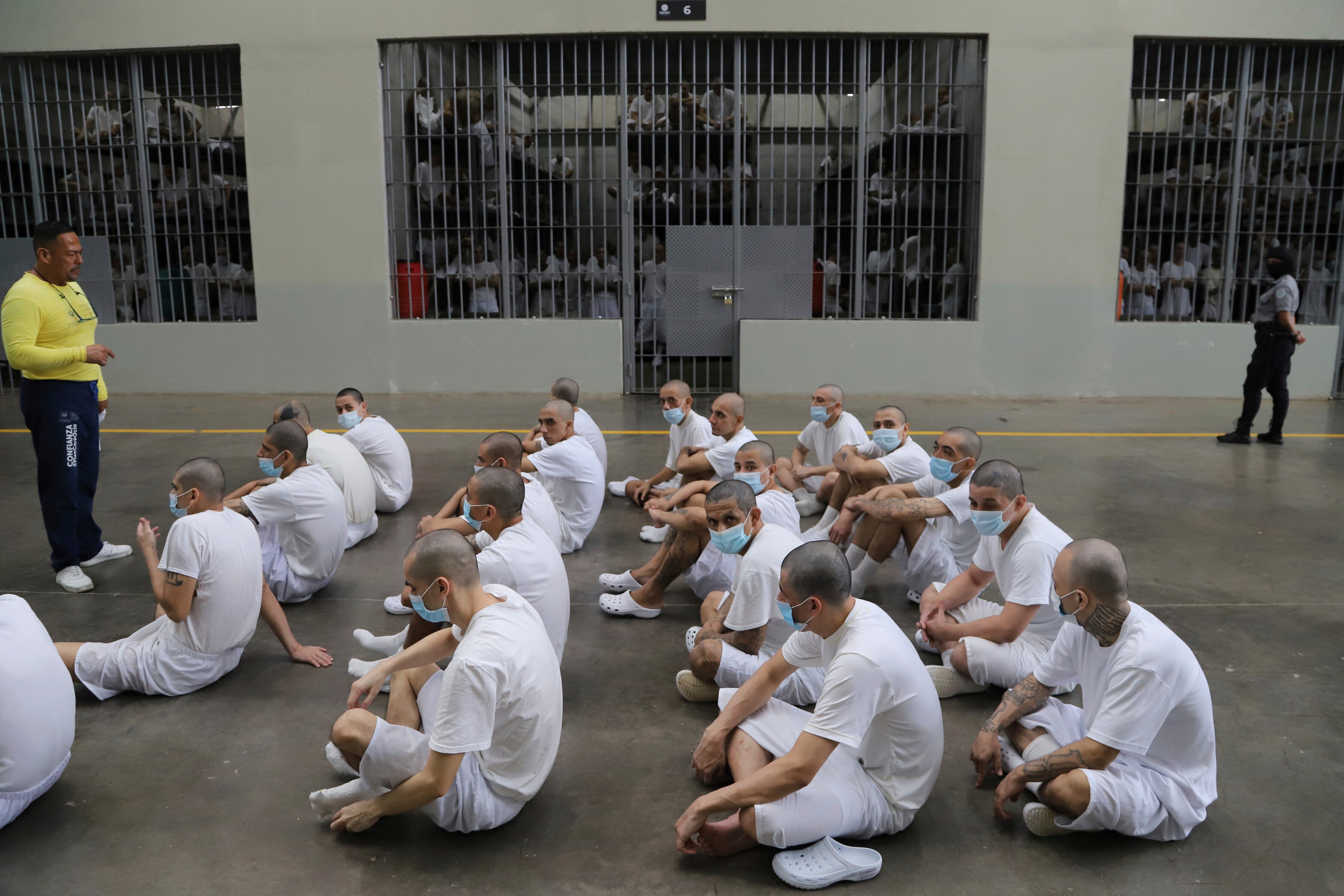 Inmates attend a class on social behaviour at CECOT