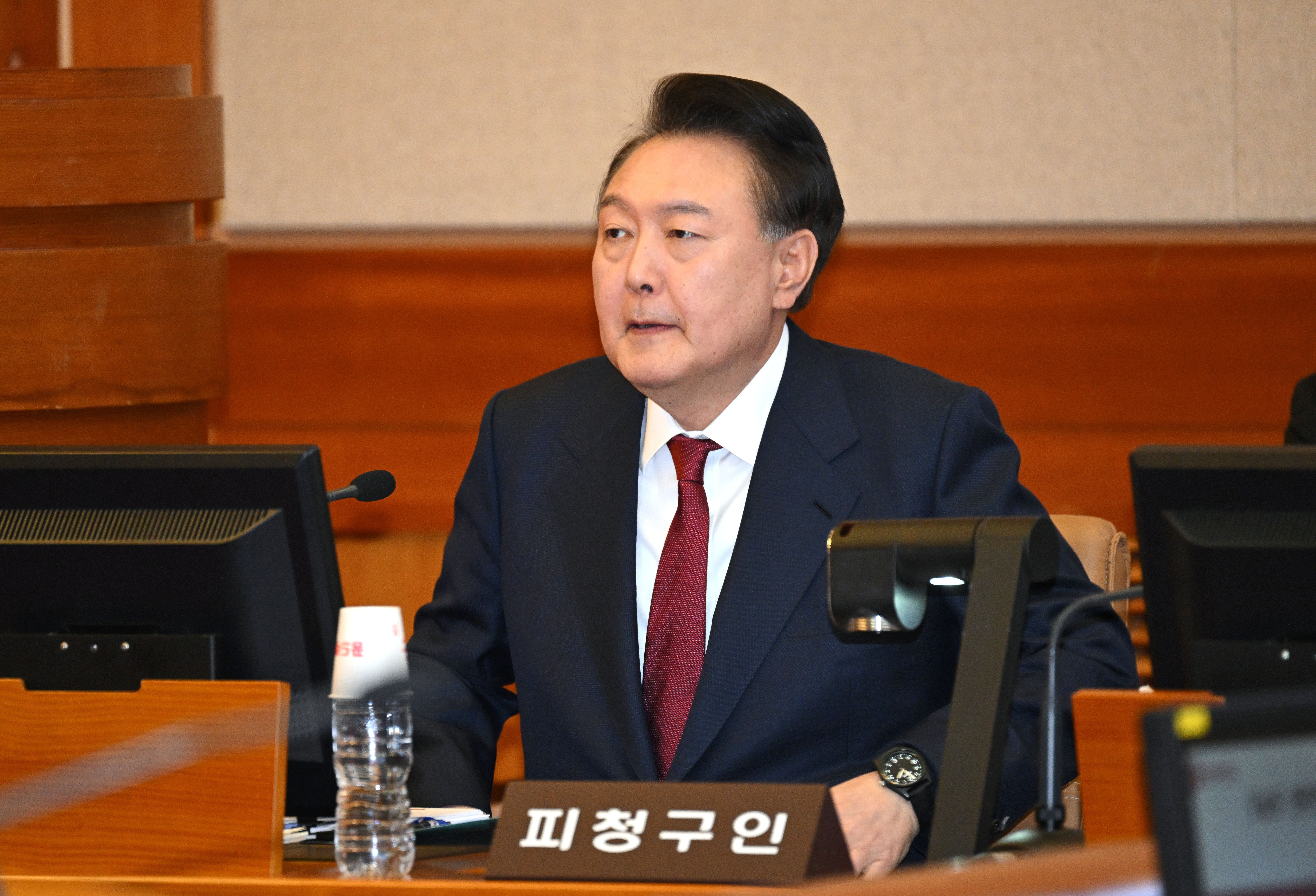 South Korean president Yoon attends his impeachment trial hearing on Wednesday