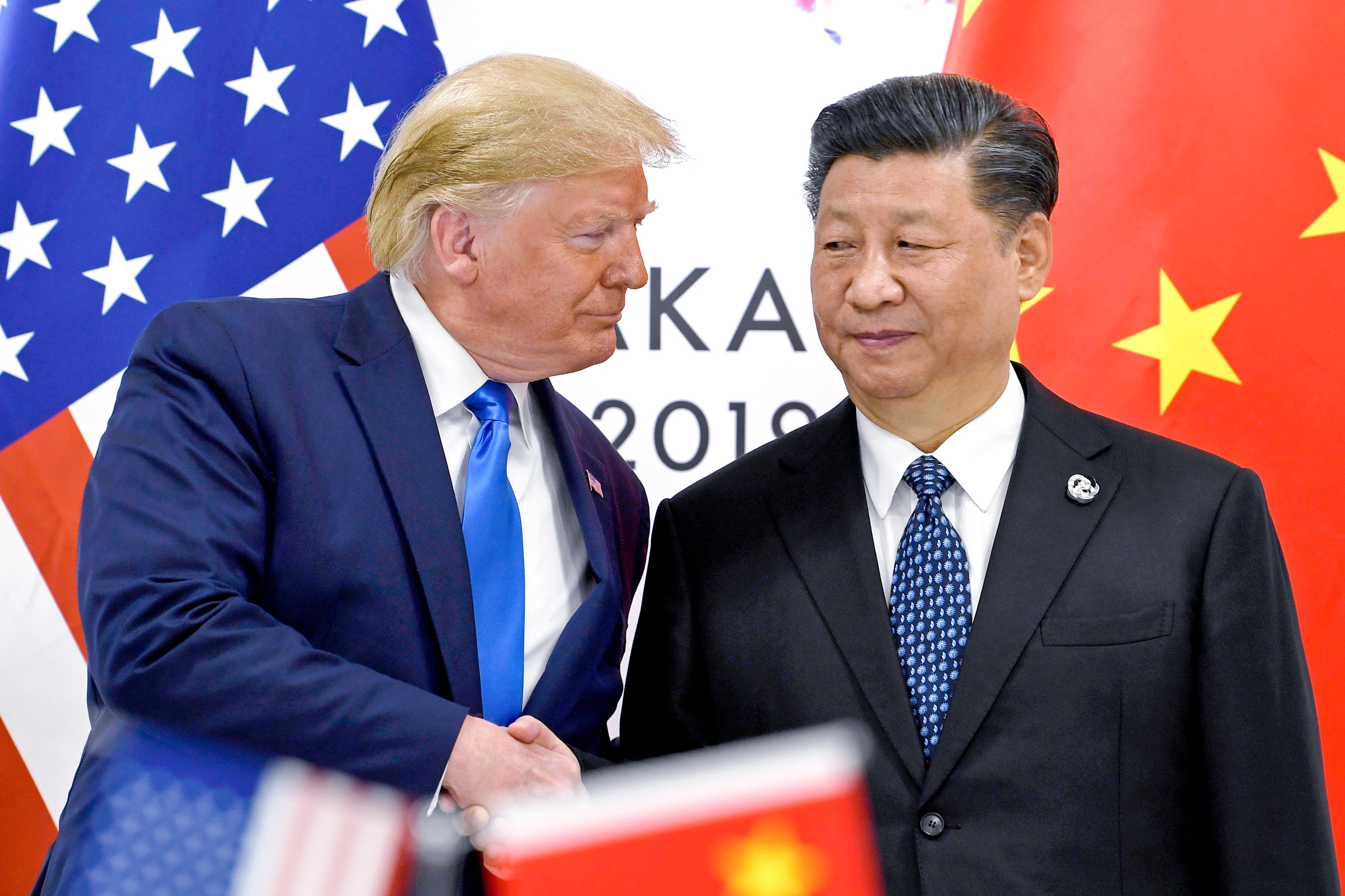 Trump, pictured with Xi Jinping in June 2019, said he is in ‘no hurry’ to defuse the new trade war between Washington and Beijing