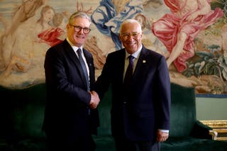 Keir Starmer, left, shakes hands with European Council president Antonio Costa