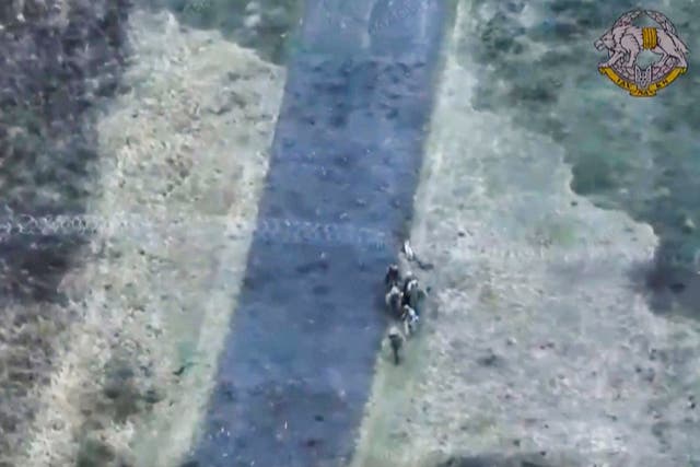 <p>This image made from a video provided by the Ukrainian Presidential Press Office on Jan. 11, 2025, shows Ukrainian forces capturing two North Korean soldiers fighting alongside Russian forces in Russia’s Kursk border region</p>