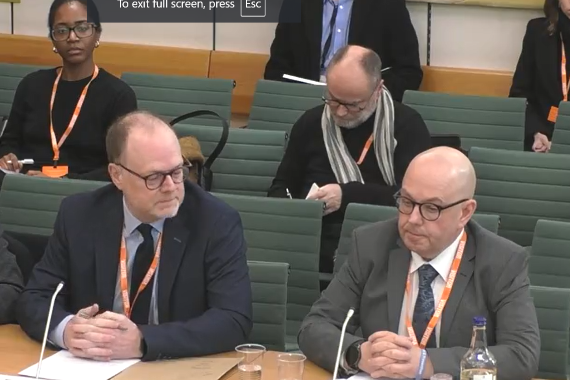 Seamus Dooley of the NUJ and journalists Trevor Birney and Barry McCaffrey (UK Parliament/PA)