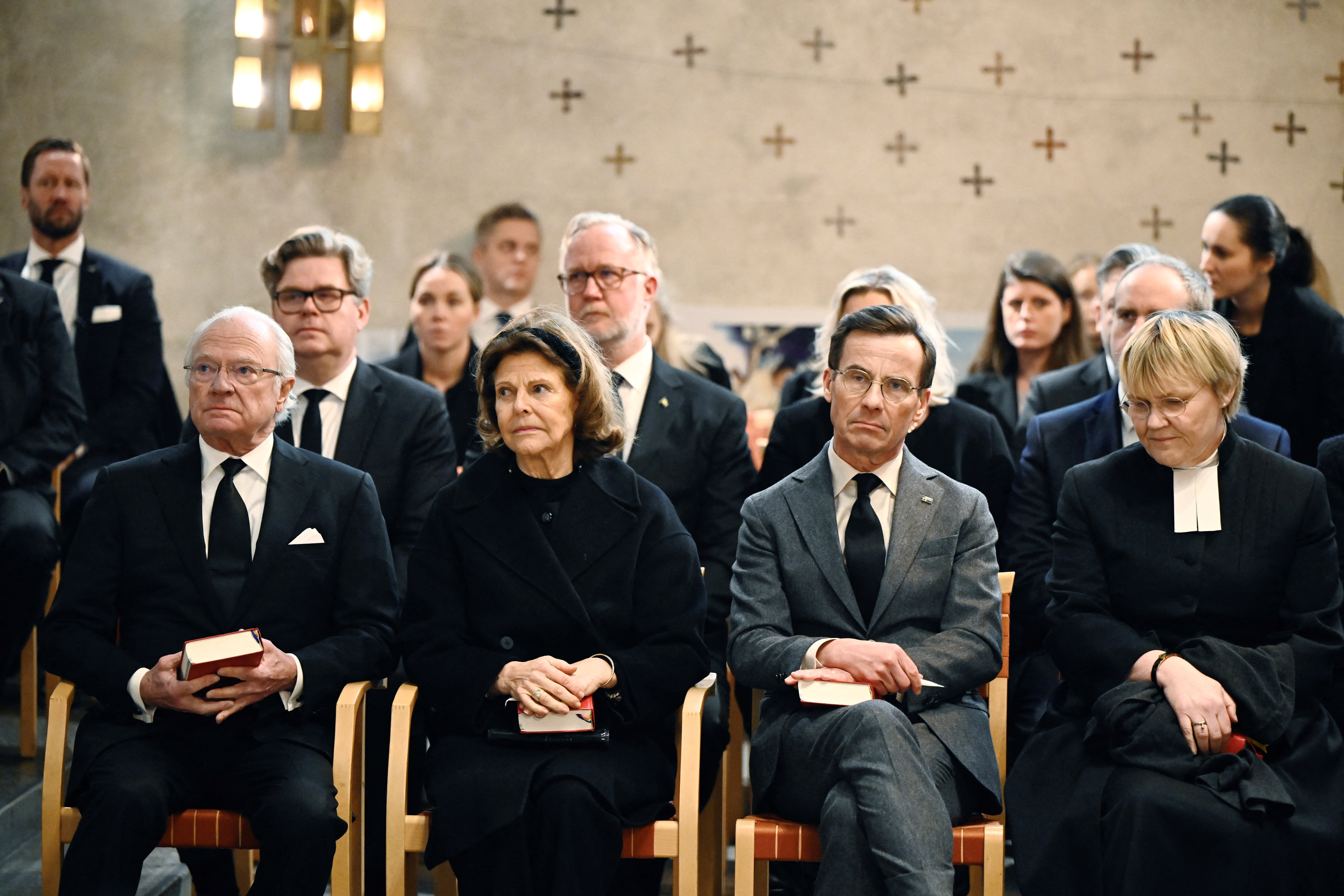 (Right to left) Sweden's King Carl Gustaf and Queen Silvia are joined by prime minister Ulf Kristersson and his wife, Birgitta Ed