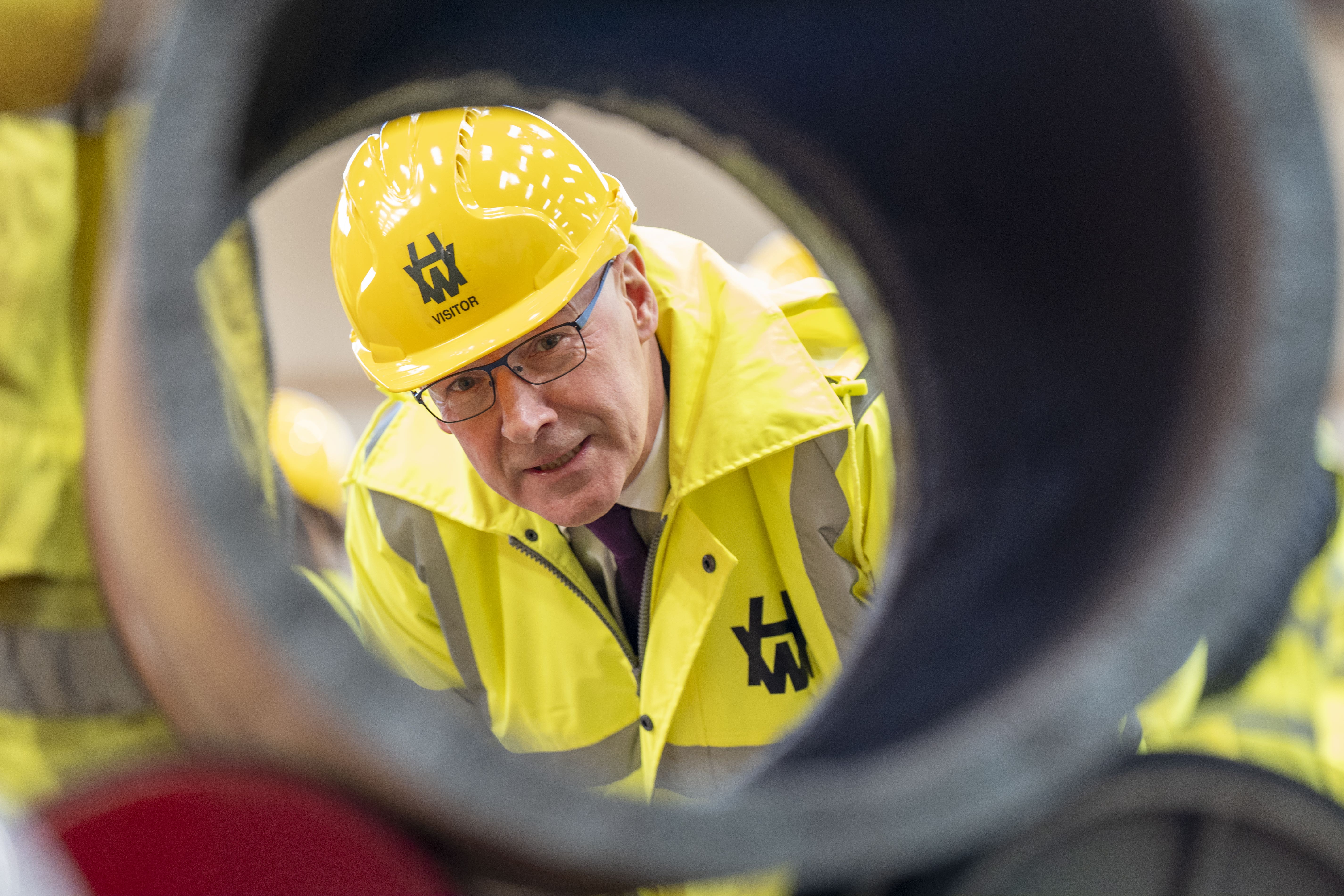 John Swinney said the acquisition of four Harland and Wolff yards by Spanish firm Navantia would provide ‘tremendous security and opportunity’ (Jane Barlow/PA)