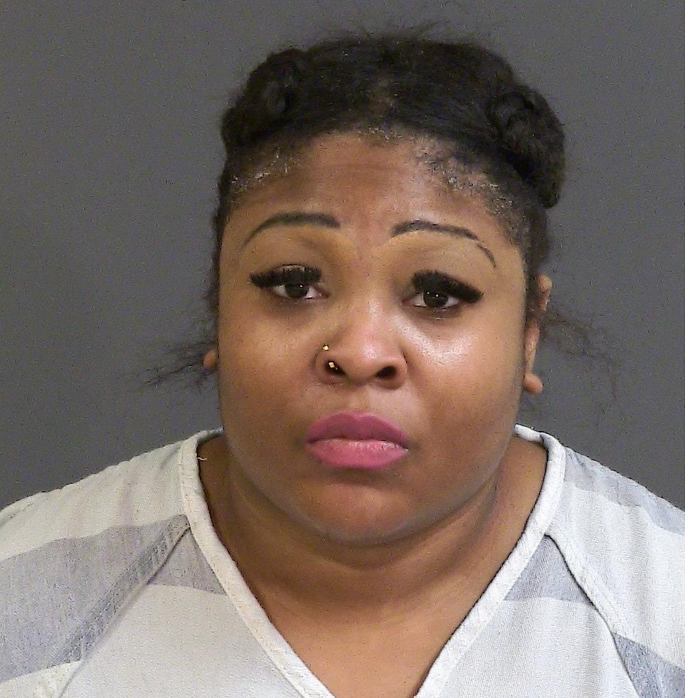 Robinson in a booking photo released by Charleston County Sheriff's Office following her arrest for entering premises after warning in South Carolina in 2021