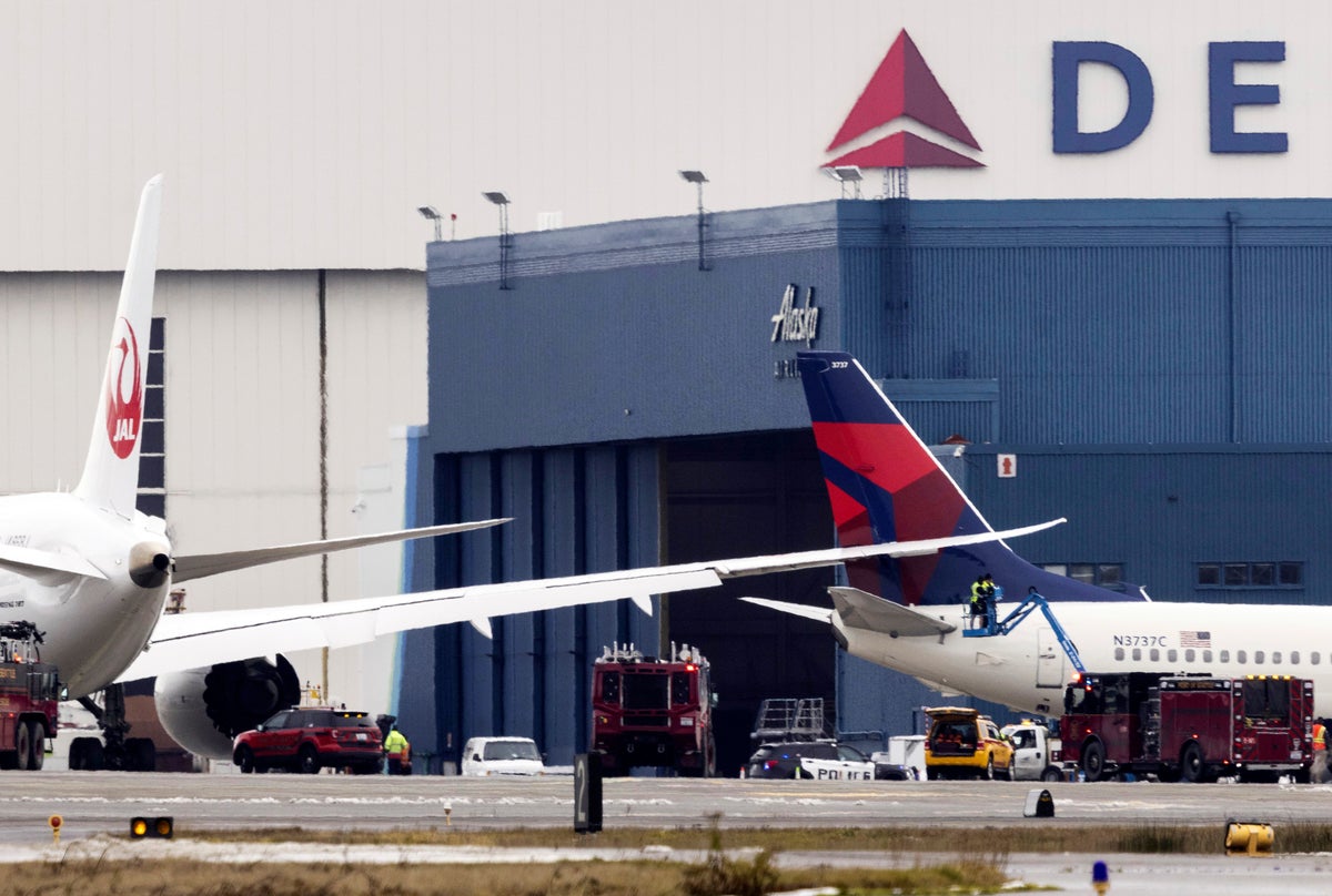 Parked Delta plane apparently struck by Japan Airlines plane that was taxiing at Seattle airport