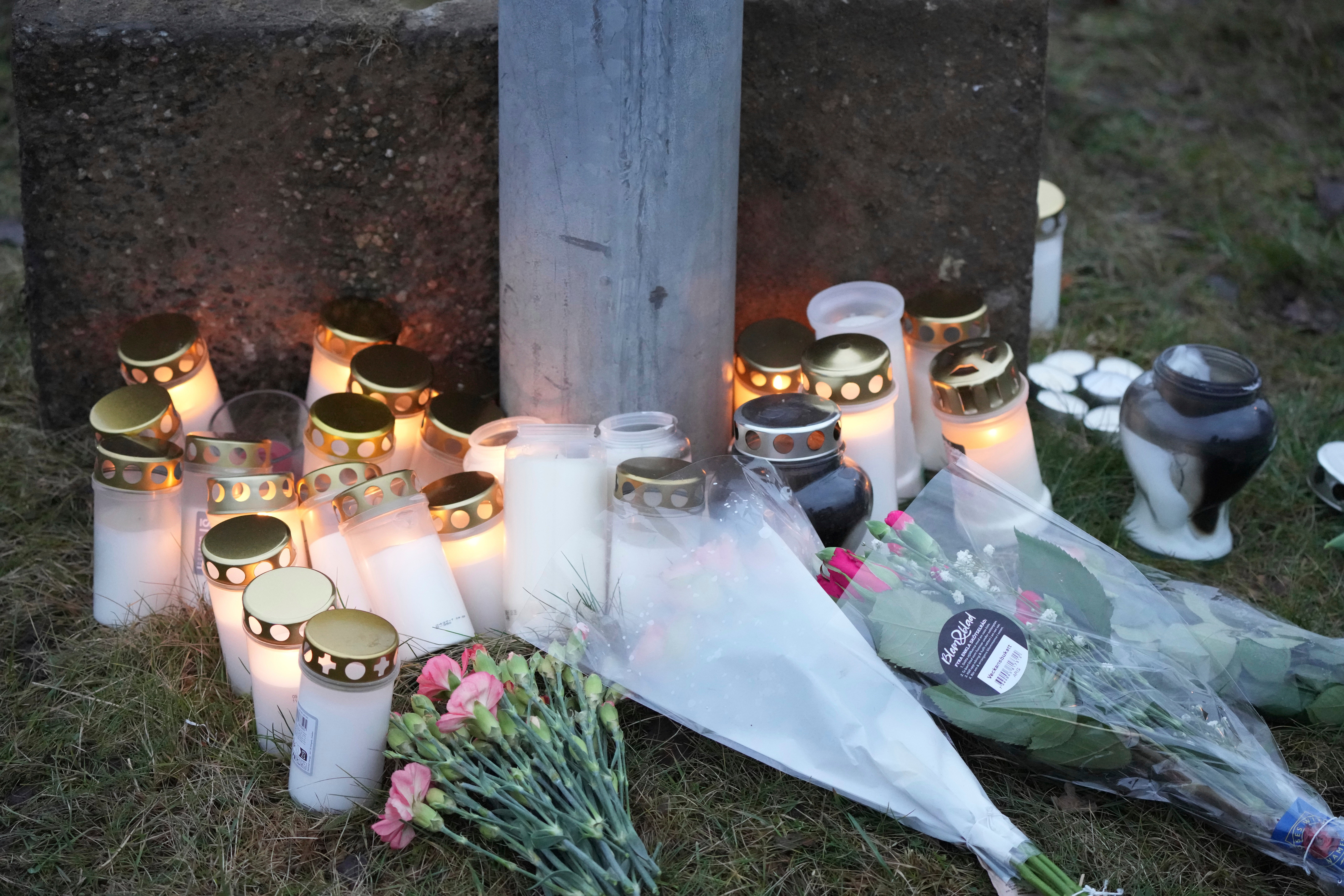 Flower tributes have been laid for those killed in the attack