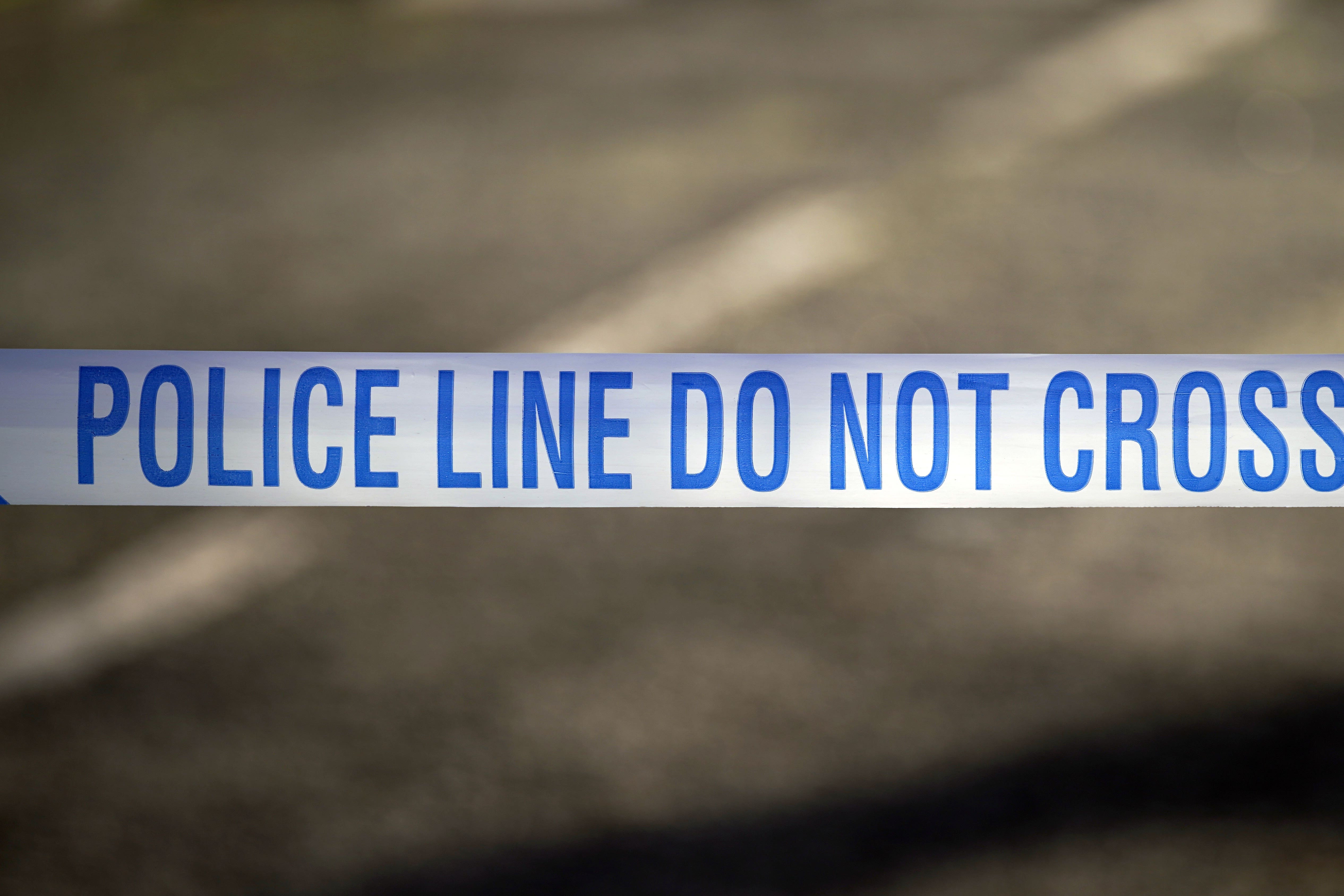 Police tape near a scene of a suspected crime (Peter Byrne/PA)