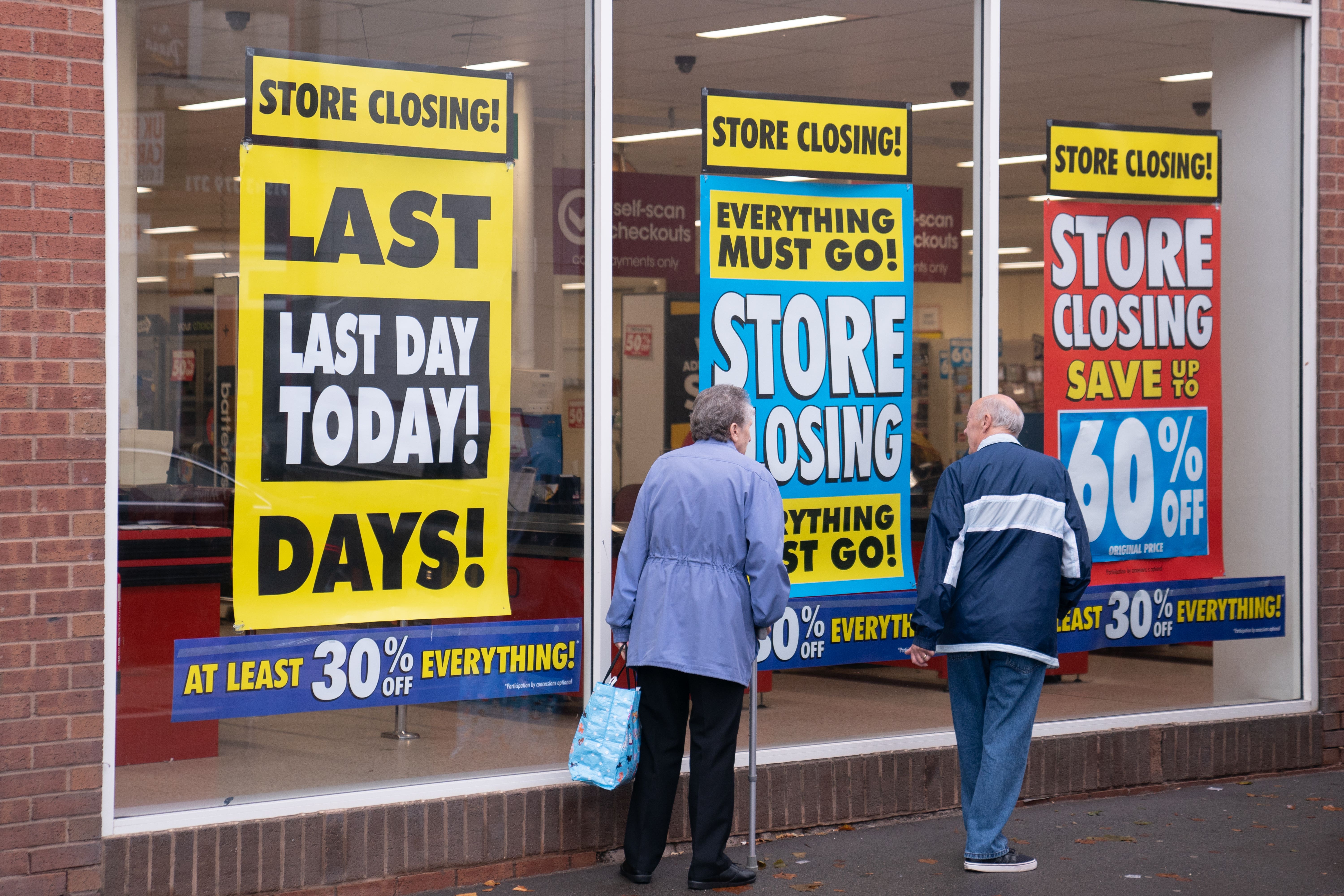 Customers walk past Wilko in Brownhills near Walsall, one of the first Wilko stores to close down