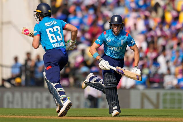 Jos Buttler, left, and Jacob Bethell both made fifties for England (Aijaz Rahi/AP)