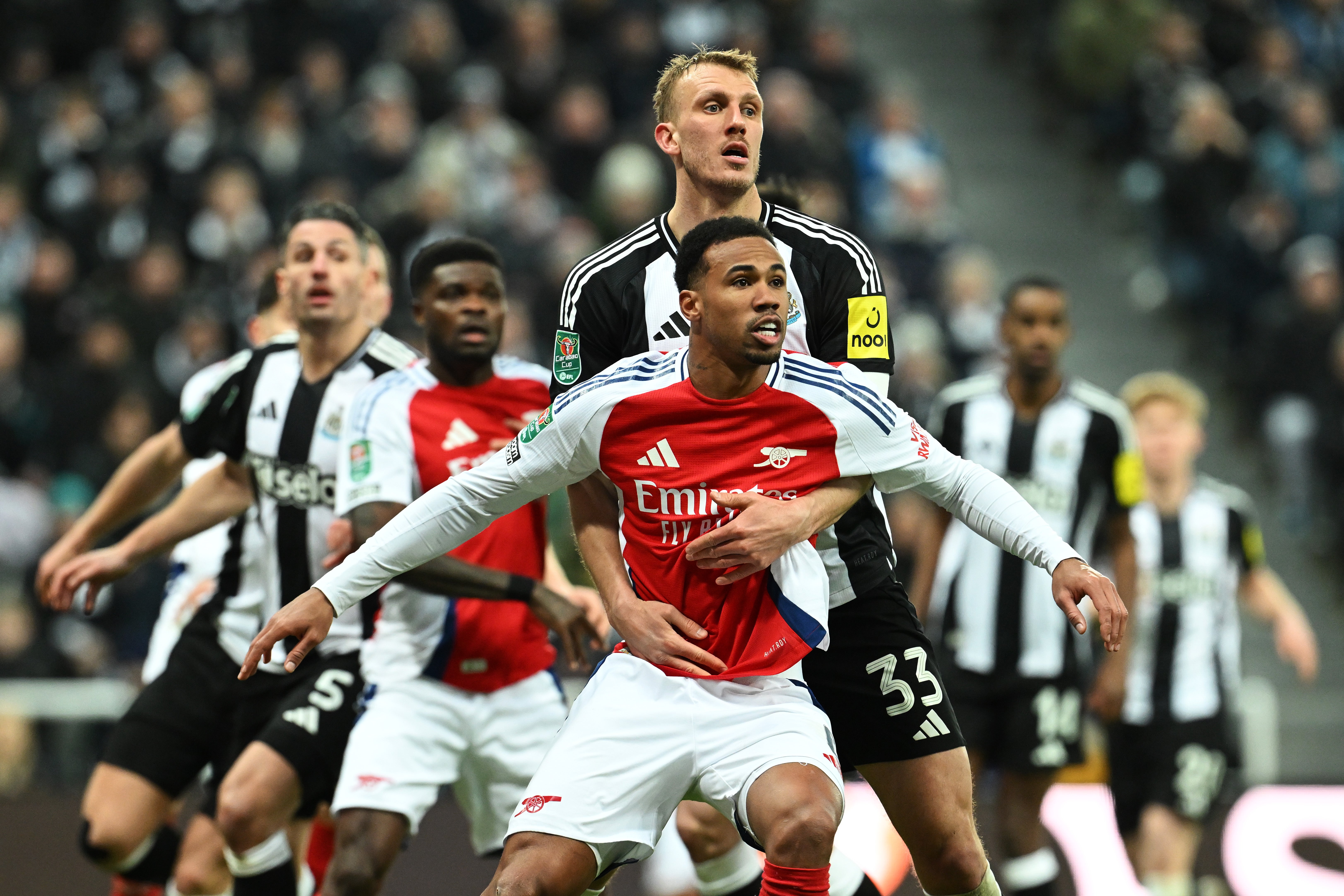 Dan Burn marks Arsenal's Gabriel at a set-piece