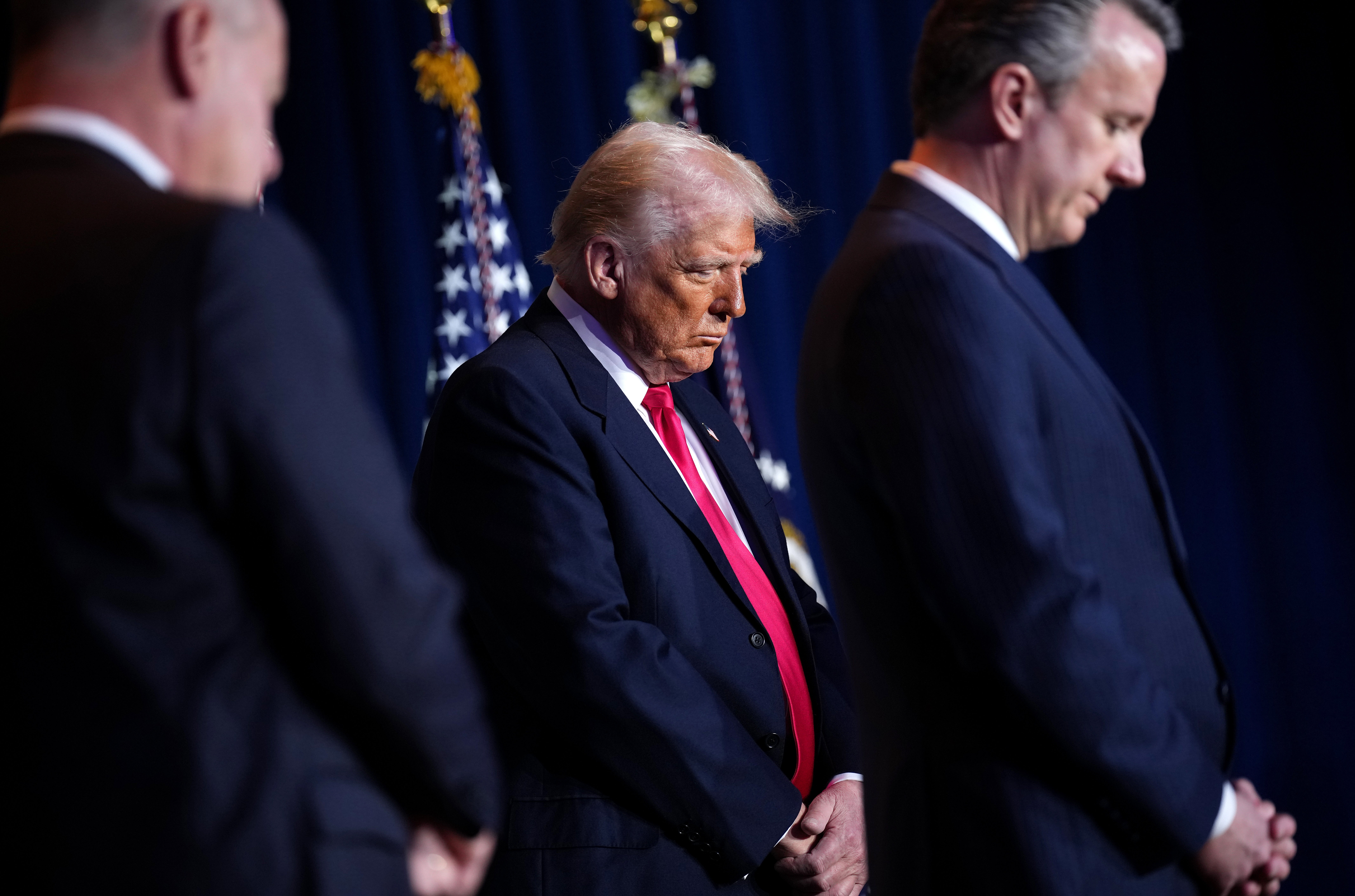 U.S. President Donald Trump participates in prayer at the National Prayer Breakfast sponsored by the The Fellowship Foundation at the Washington Hilton on February 06, 2025 in Washington, D.C.