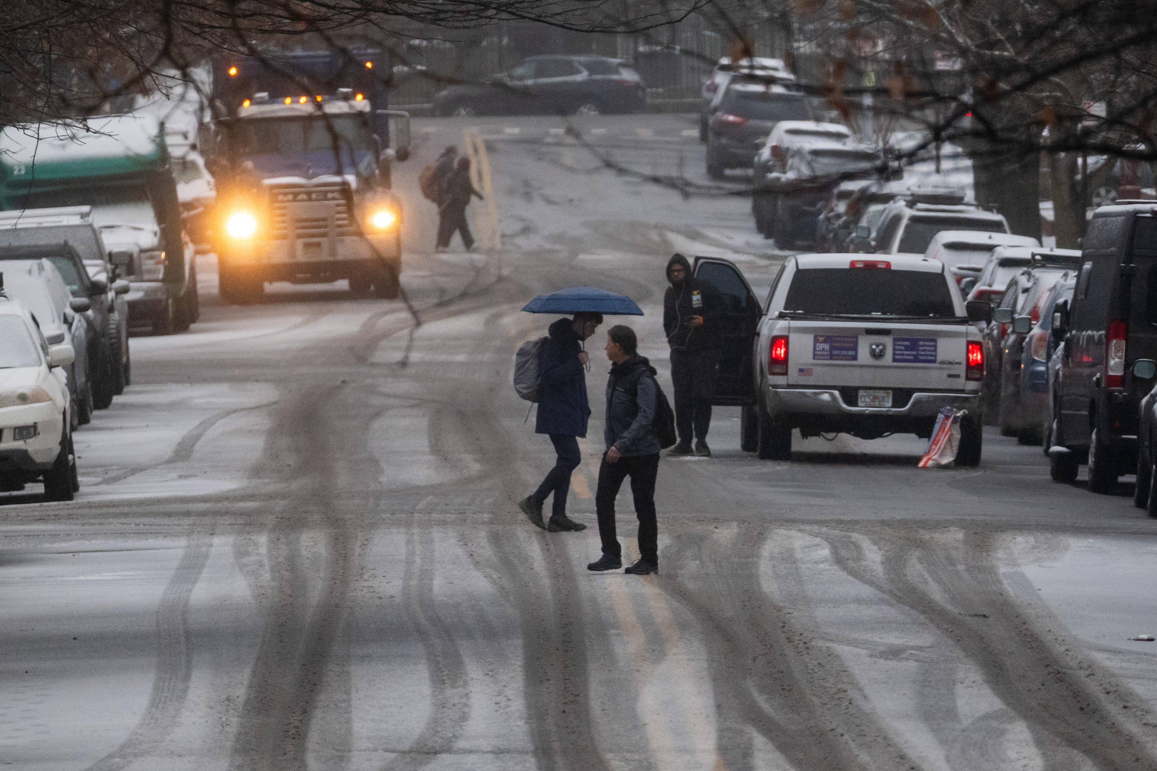 In New York City, a slushie-mix brought a difficult morning commute for pedestrians and drivers