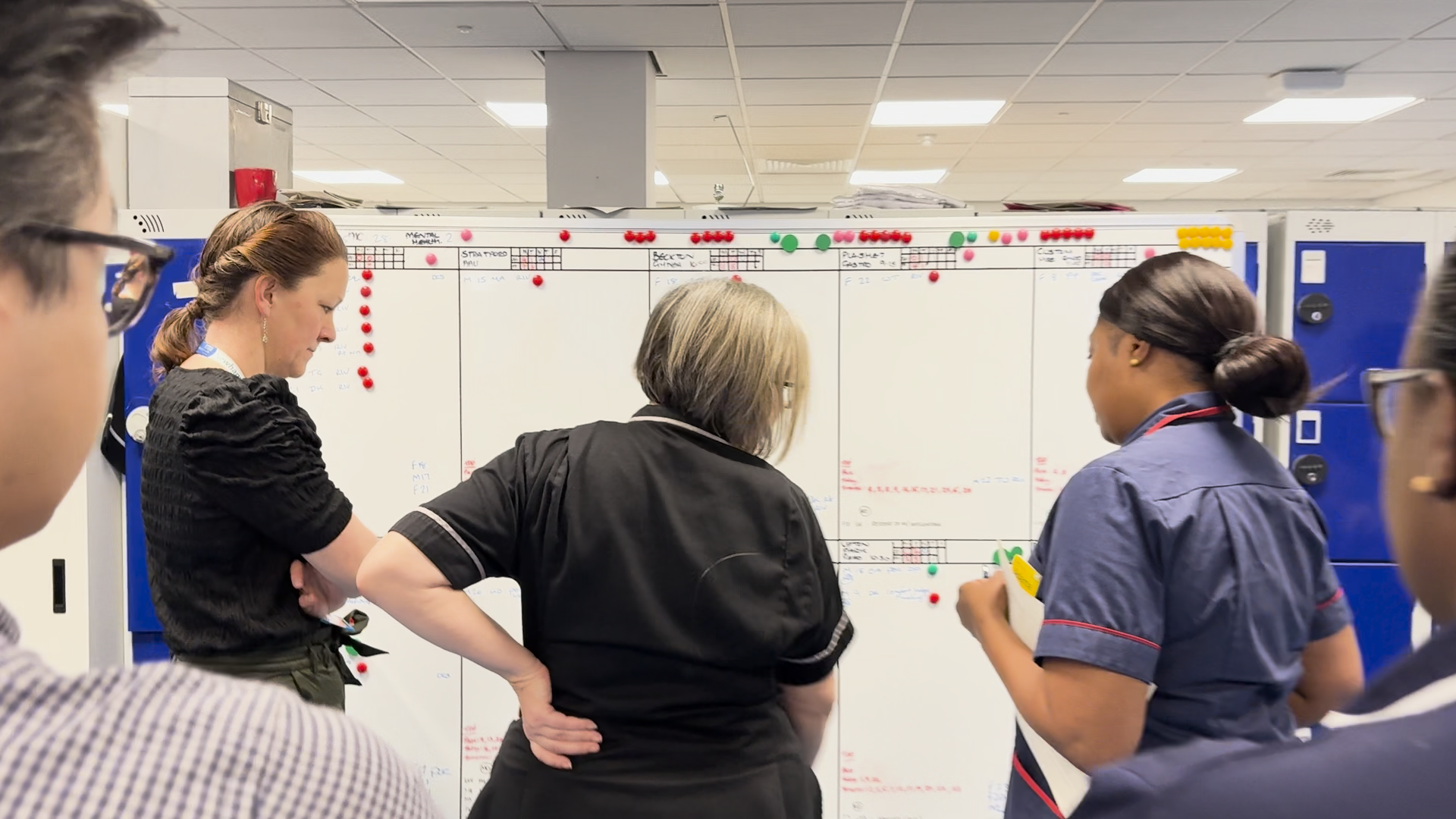 Jennifer Walker, left, at the morning operation meeting at Newham Hospital