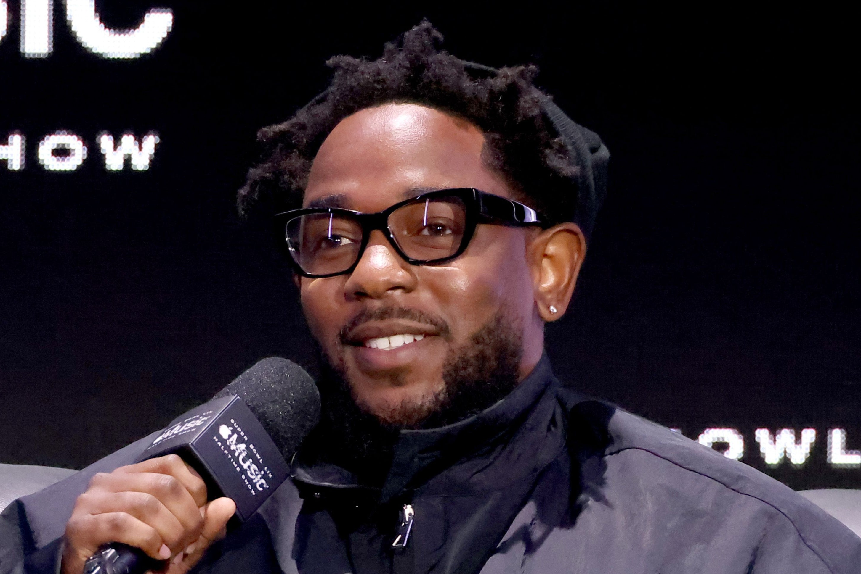 Kendrick Lamar speaking during the Super Bowl LVIX Pregame & Apple Music Super Bowl LVIX Halftime Show Press Conference on February 6, 2025