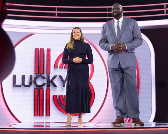 <p>Gina Rodriguez and Shaquille O'Neal hosting Lucky 13 </p>