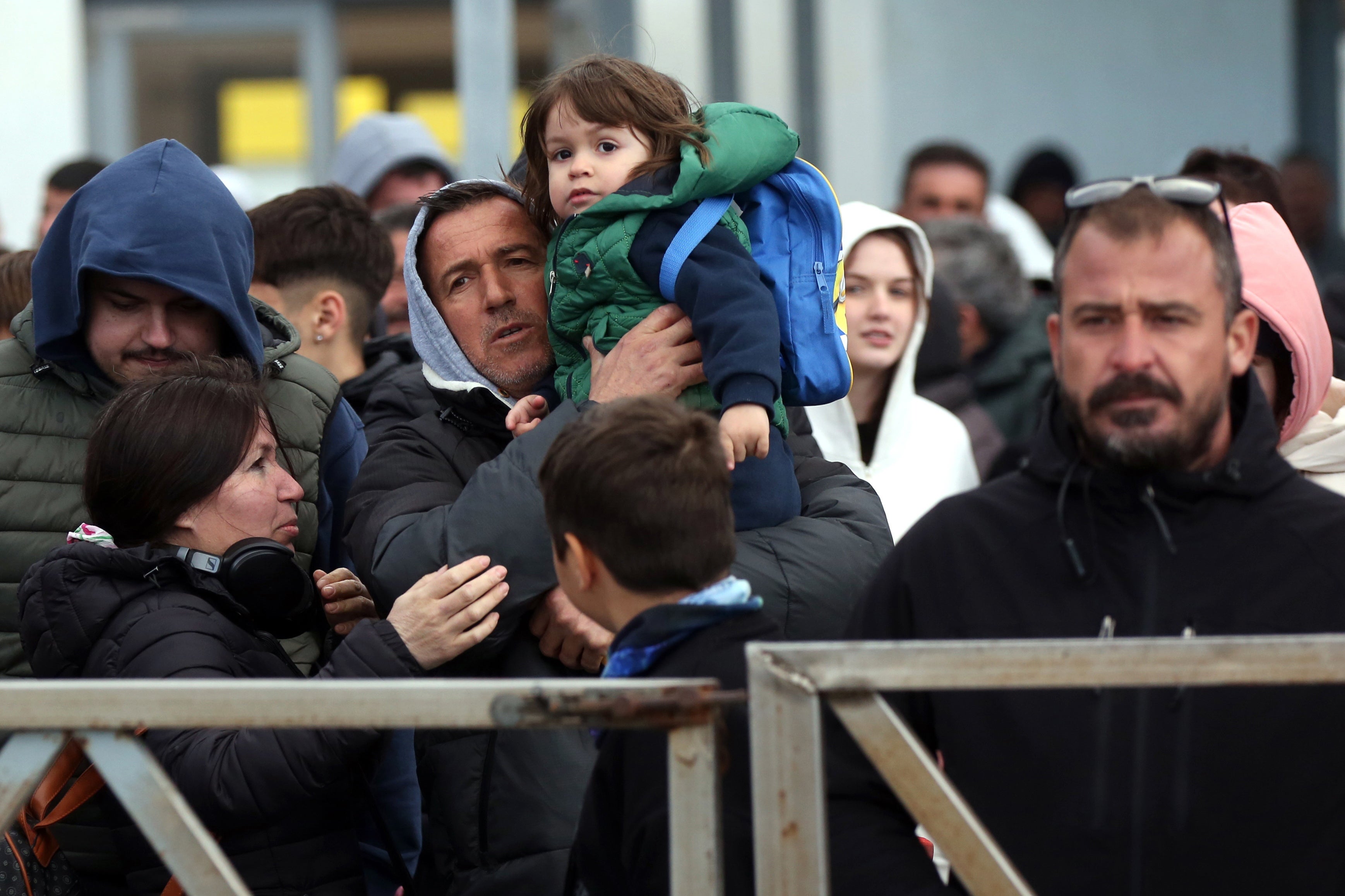 Residents and visitors wait to leave the island due to the increased seismic activity