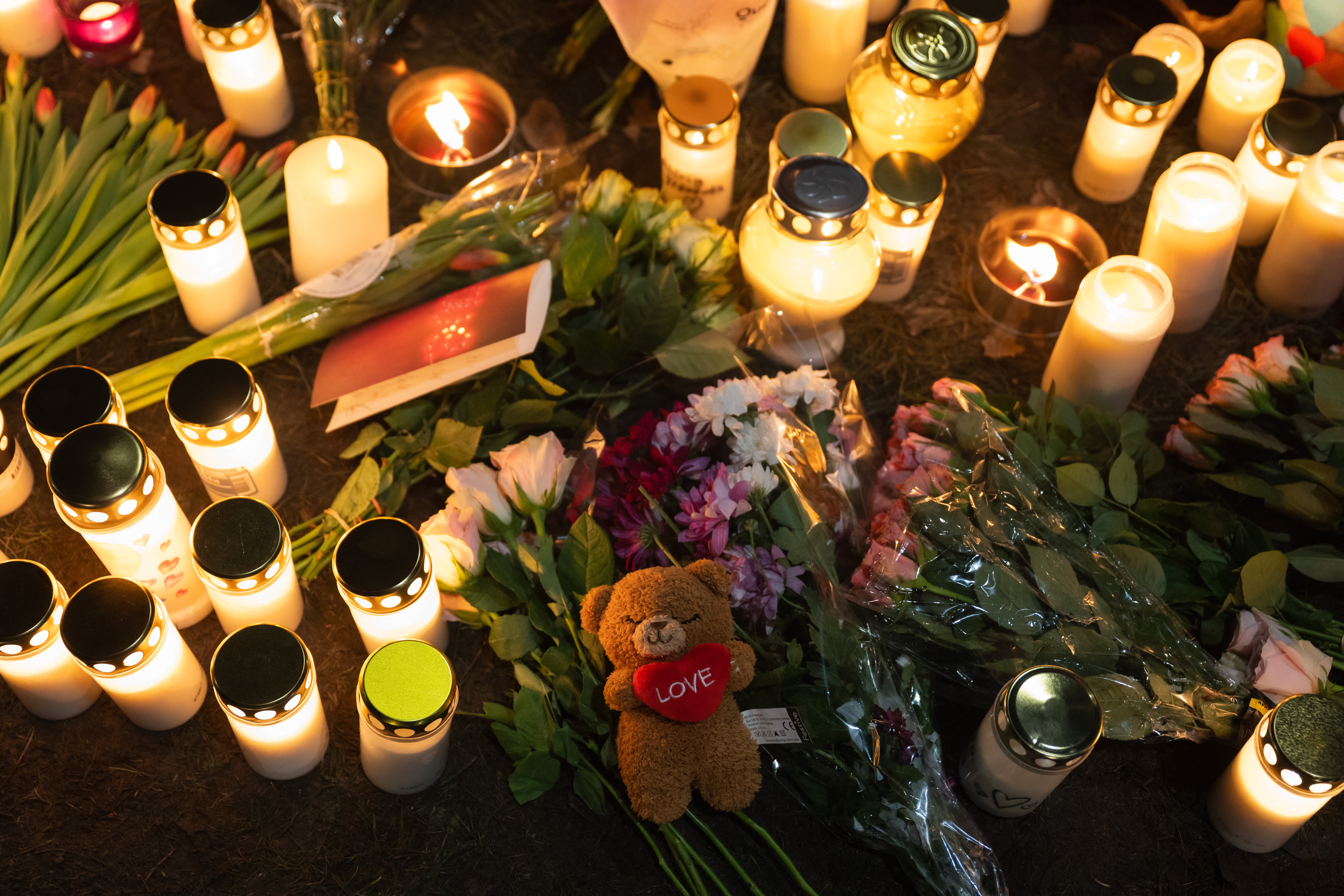 A makeshift vigil is pictured near the adult education center Campus Risbergska school in Orebro, Sweden, on 5 February 2025